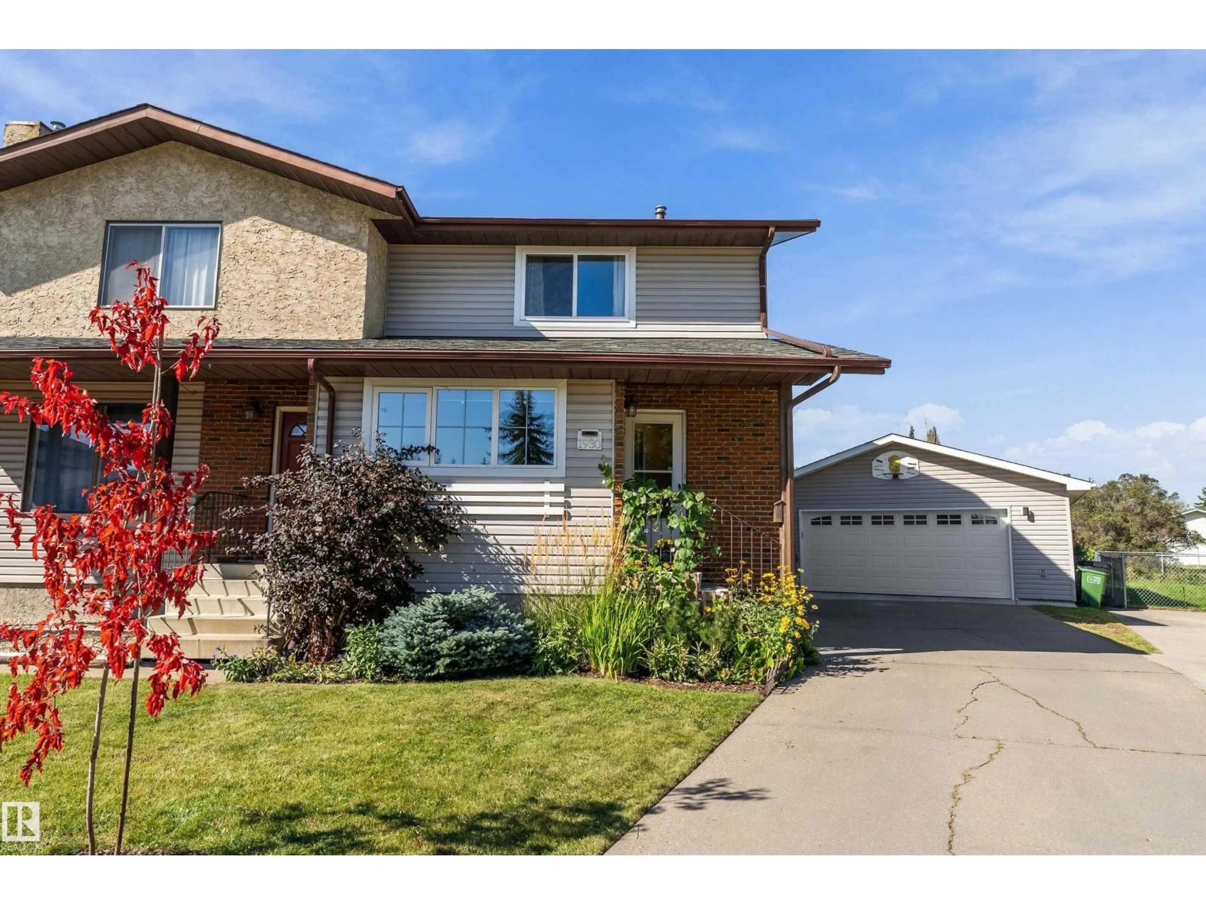 Home with vinyl exterior material, street for NW - 1930 104 ST, Edmonton Alberta T6J5A7