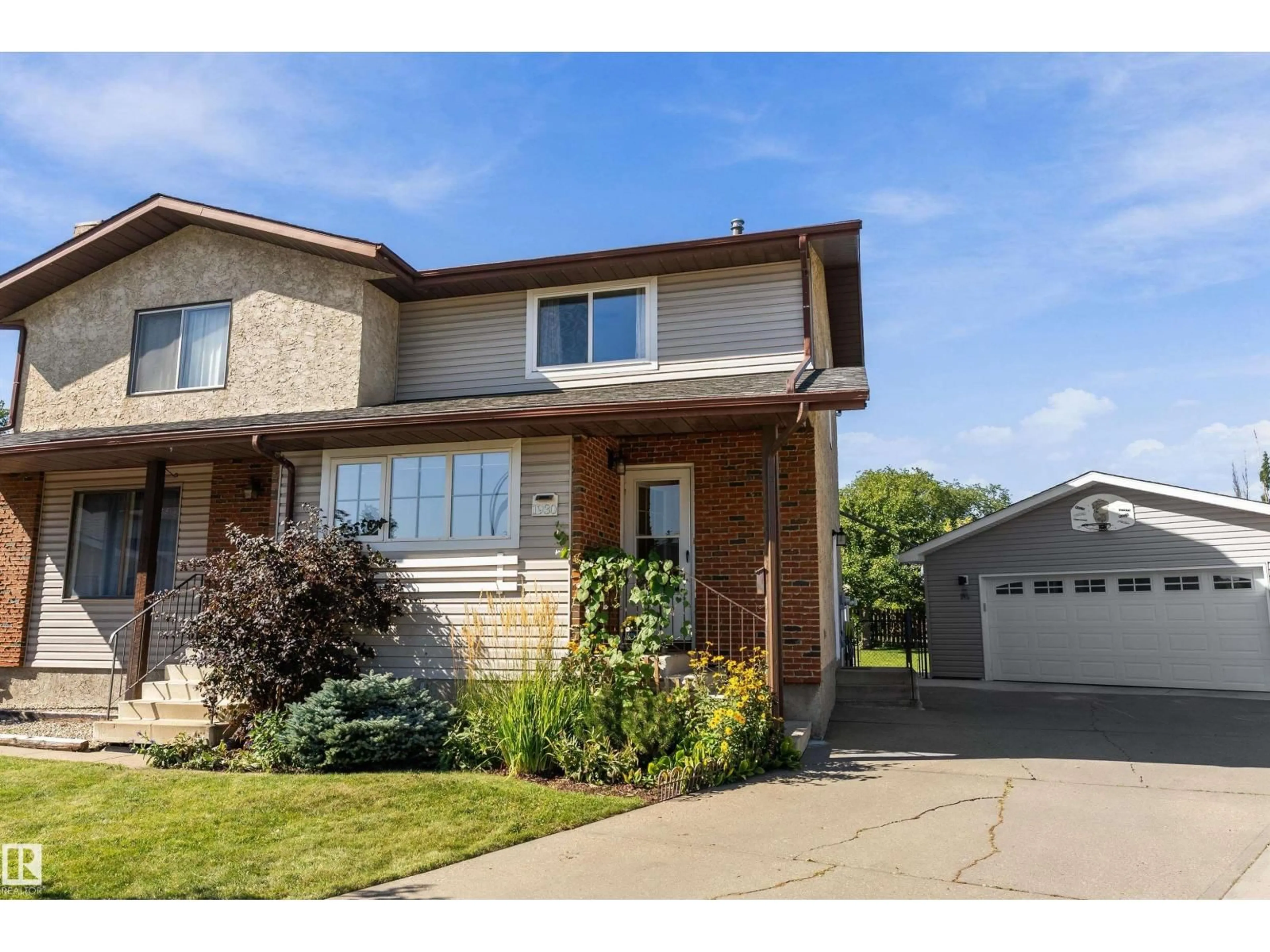 Home with brick exterior material, street for NW - 1930 104 ST, Edmonton Alberta T6J5A7
