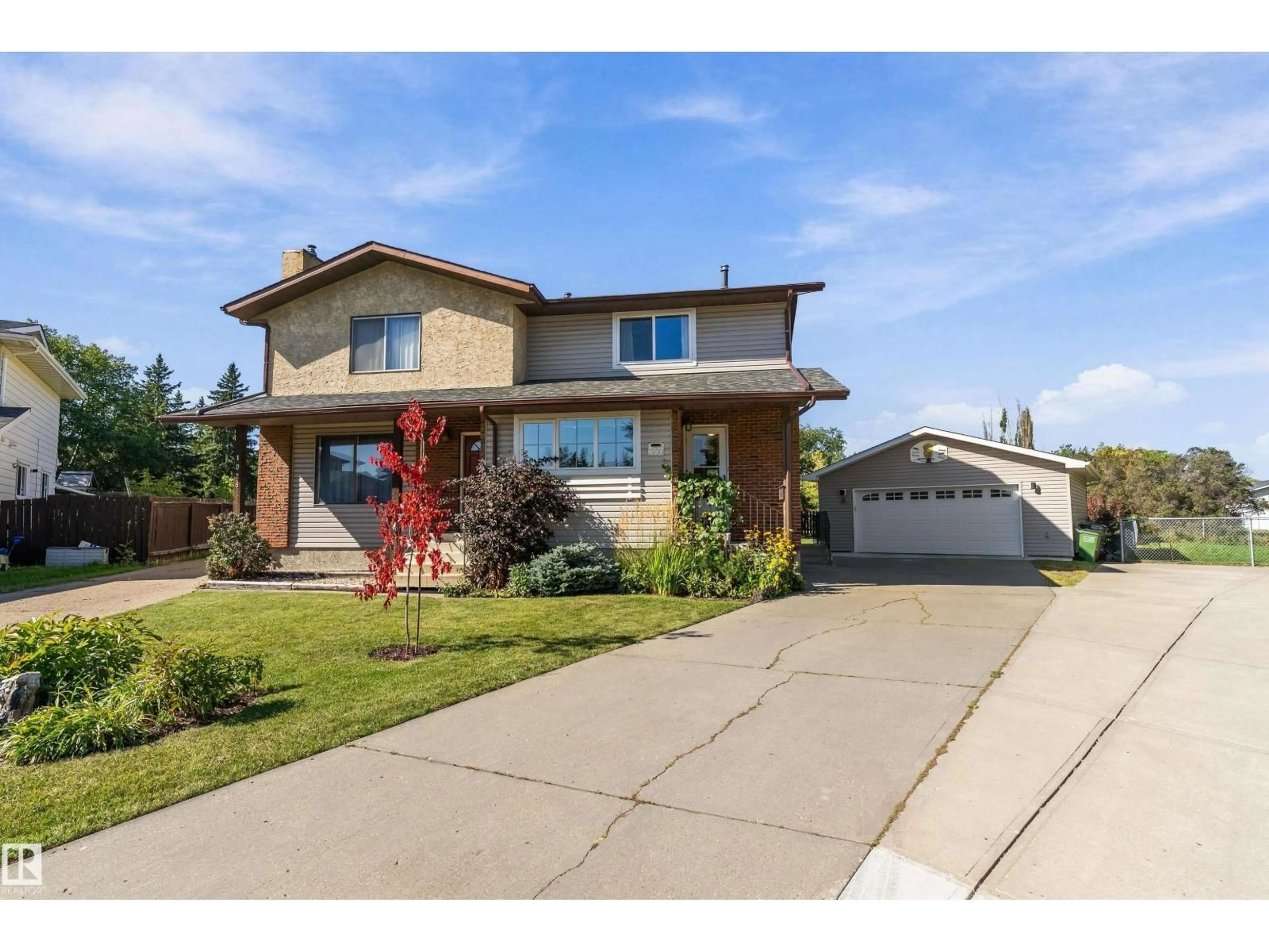 Home with brick exterior material, street for NW - 1930 104 ST, Edmonton Alberta T6J5A7