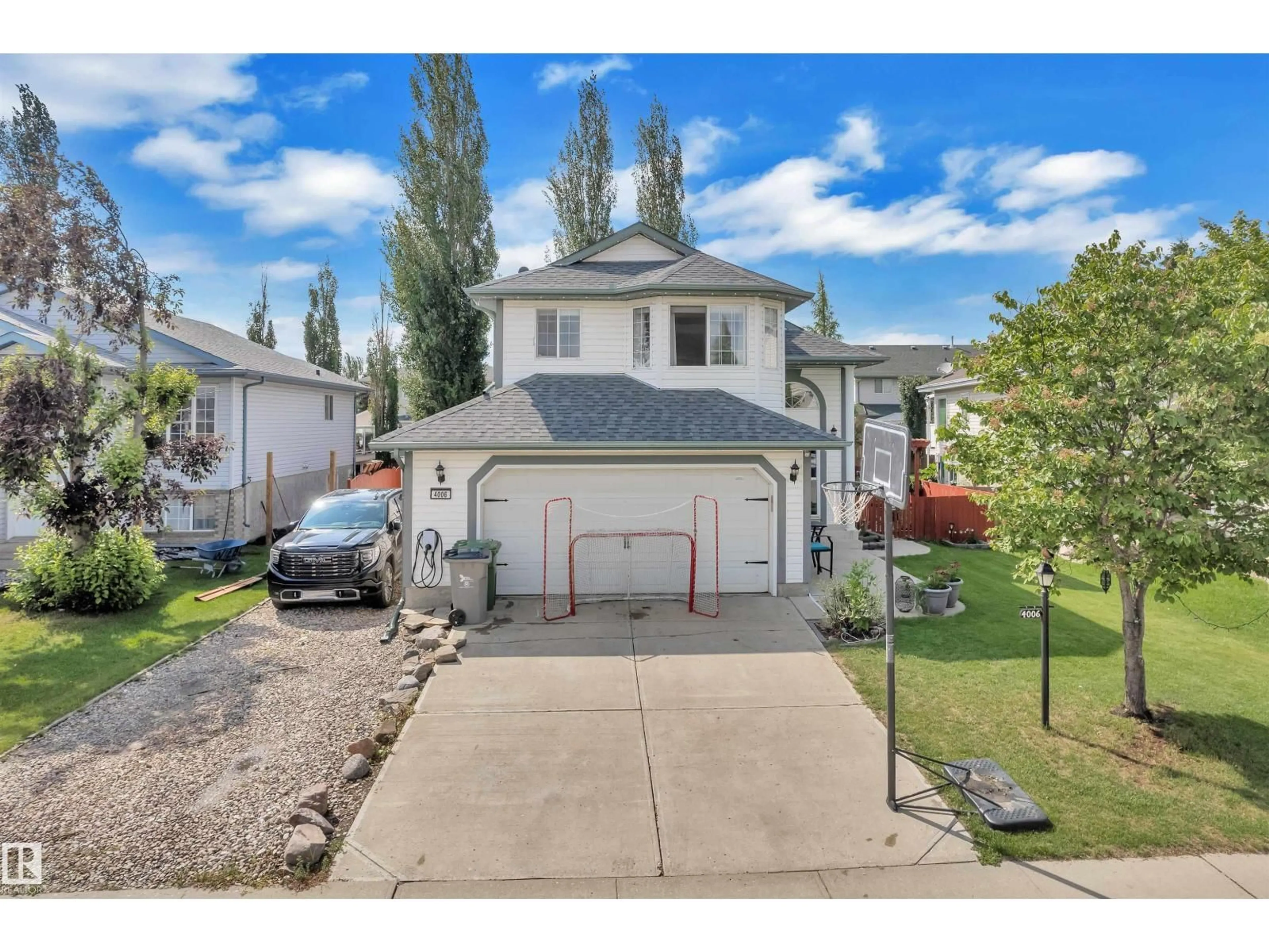 A pic from outside/outdoor area/front of a property/back of a property/a pic from drone, street for 4006 53, Beaumont Alberta T4X1N4