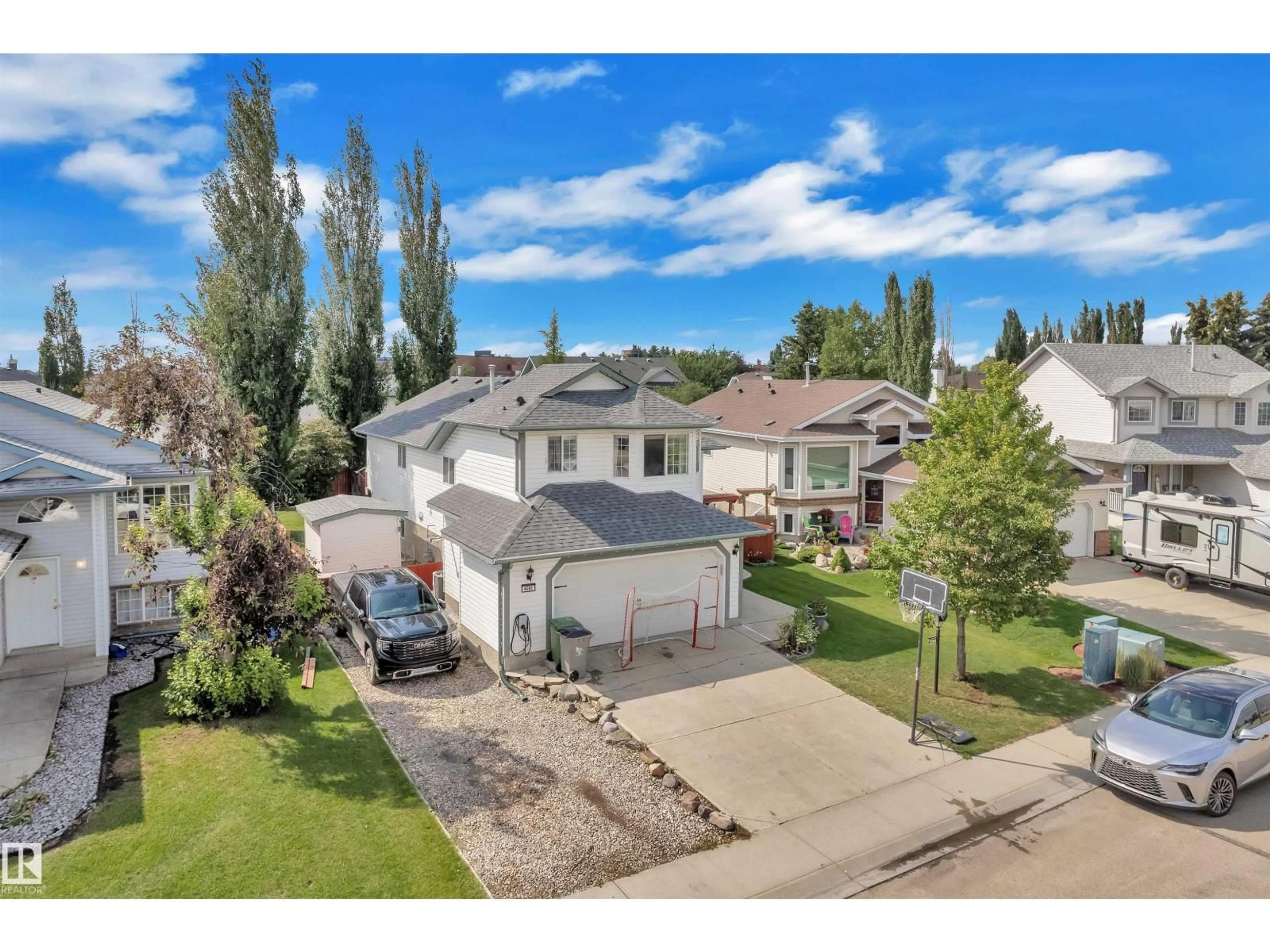 A pic from outside/outdoor area/front of a property/back of a property/a pic from drone, unknown for 4006 53, Beaumont Alberta T4X1N4