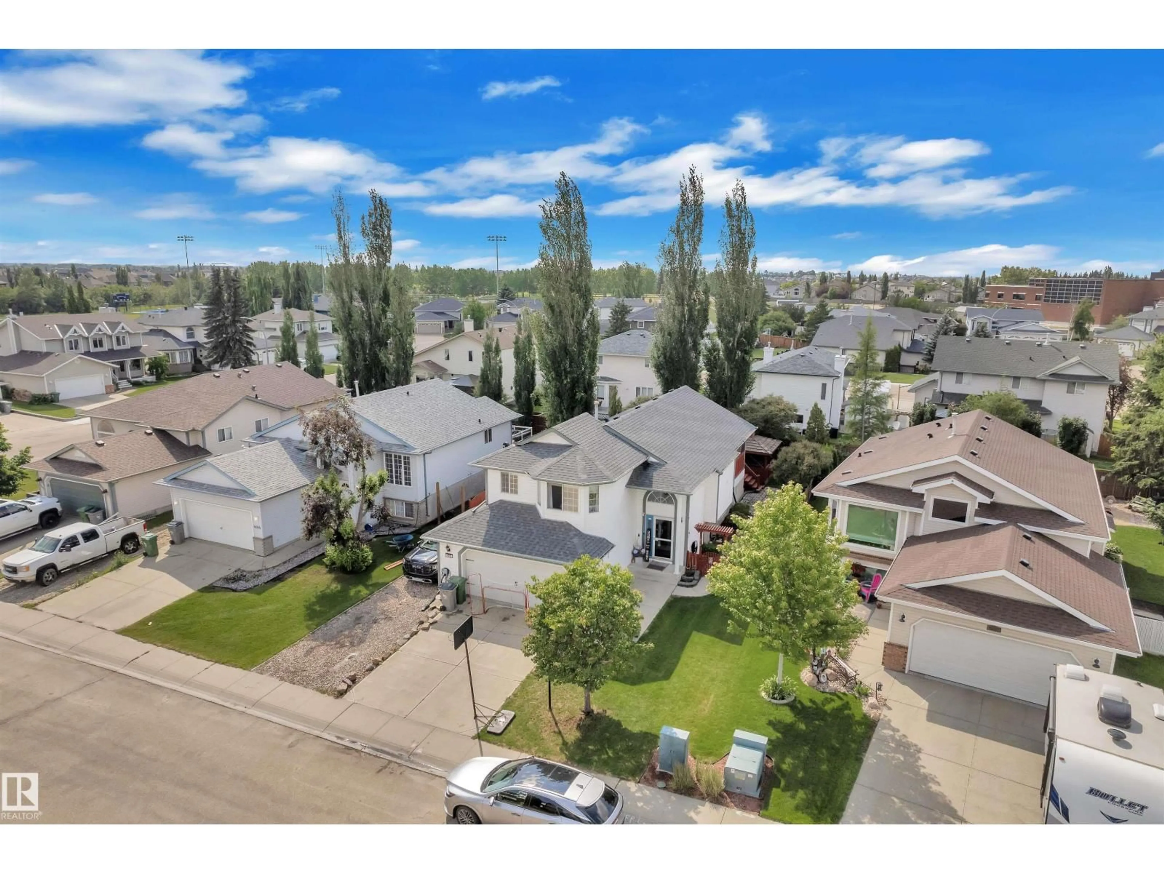 A pic from outside/outdoor area/front of a property/back of a property/a pic from drone, unknown for 4006 53, Beaumont Alberta T4X1N4