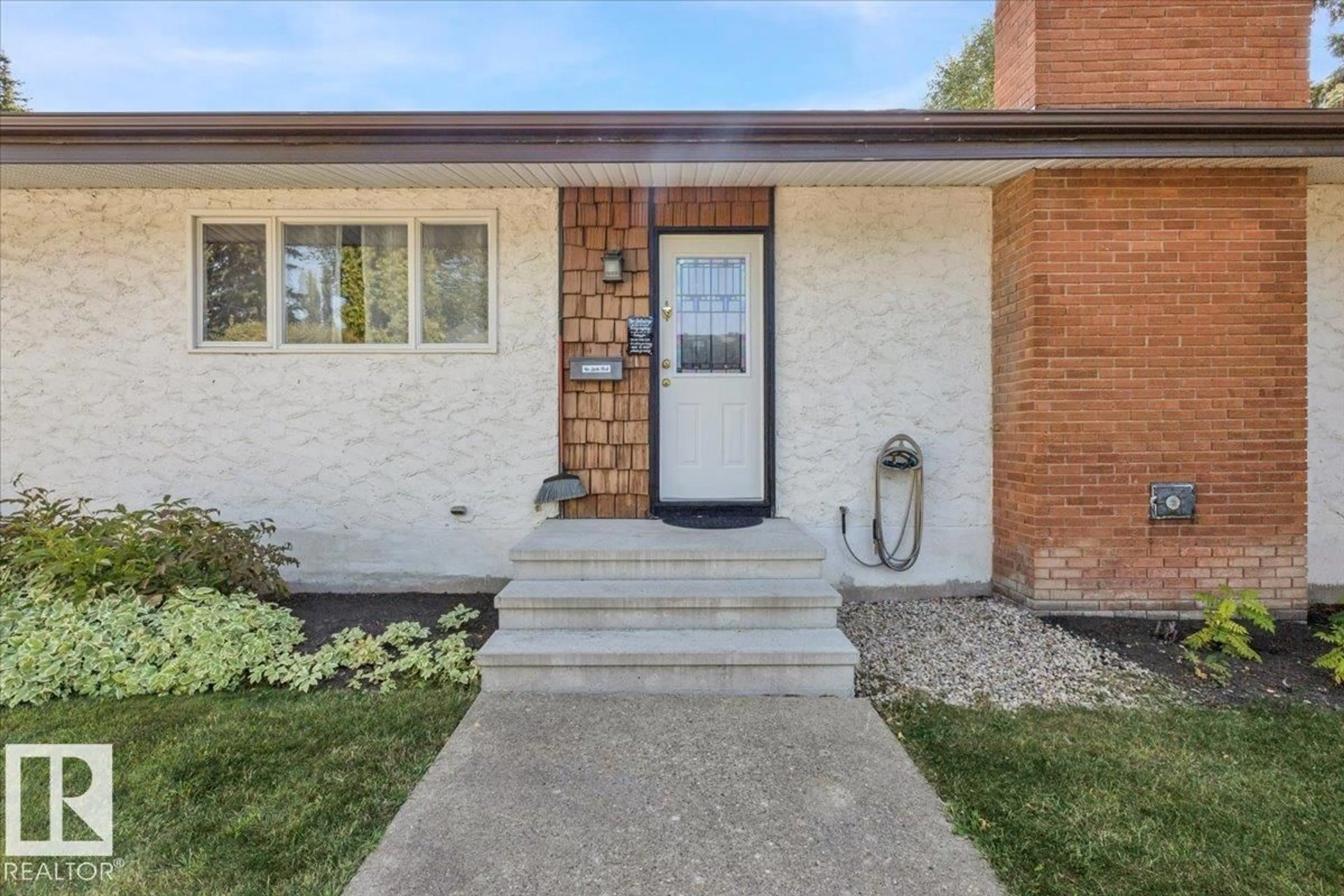 Home with brick exterior material, street for NW - 15012 77 AV, Edmonton Alberta T5R3B3