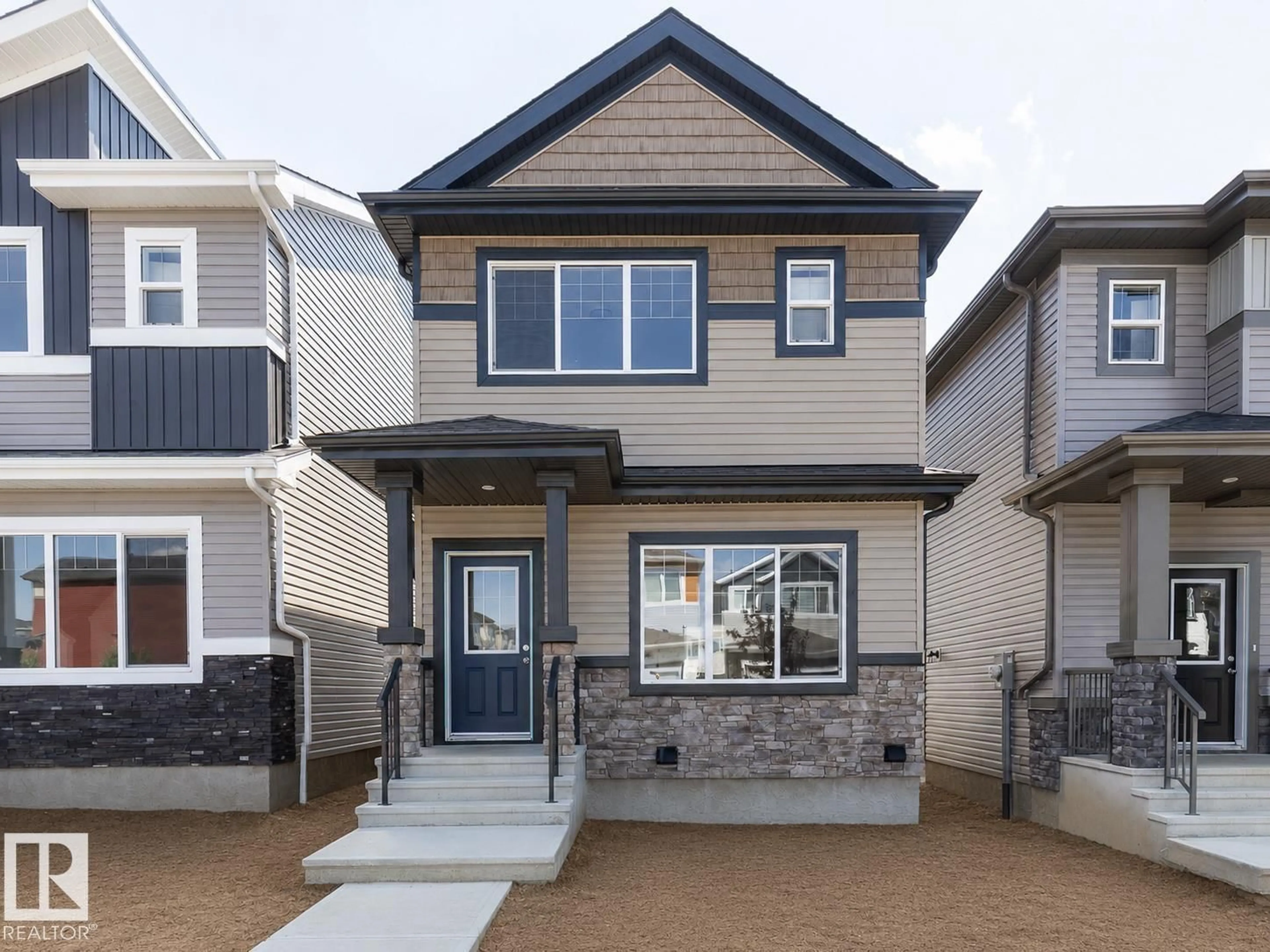 Home with vinyl exterior material, street for 3611 TRIOMPHE BV, Beaumont Alberta T4X3A7