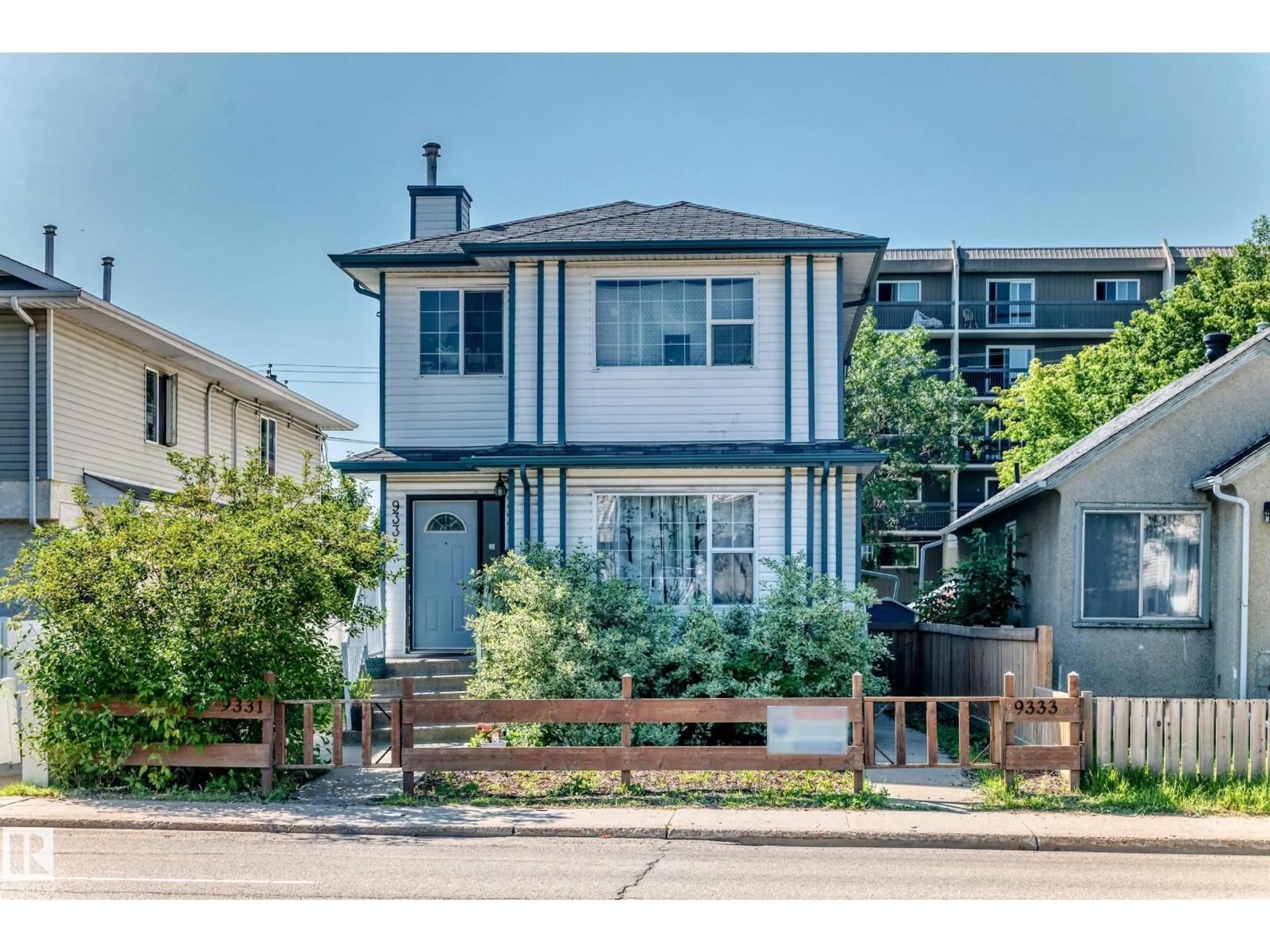 Home with vinyl exterior material, street for 9333 103A AV, Edmonton Alberta T5H0H3