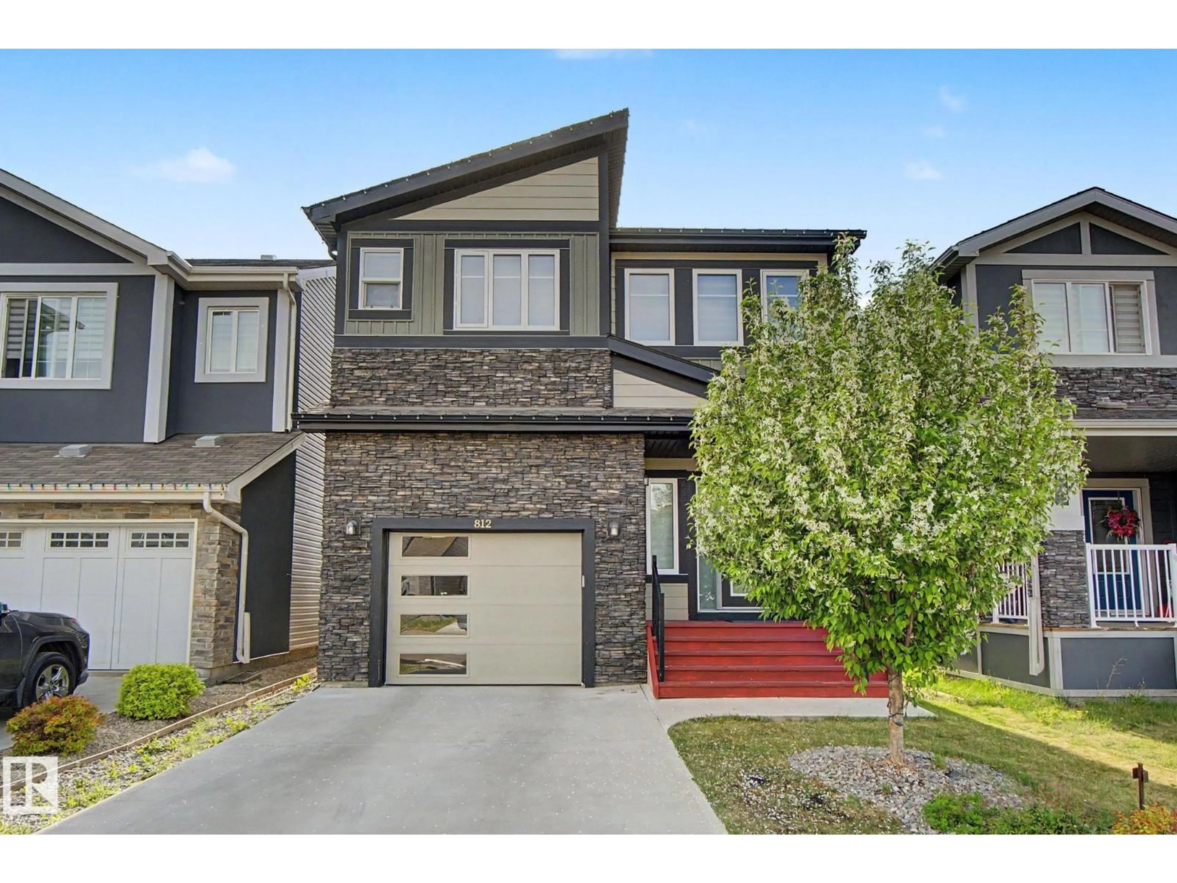 Home with brick exterior material, street for 812 176 ST, Edmonton Alberta T6W2X3