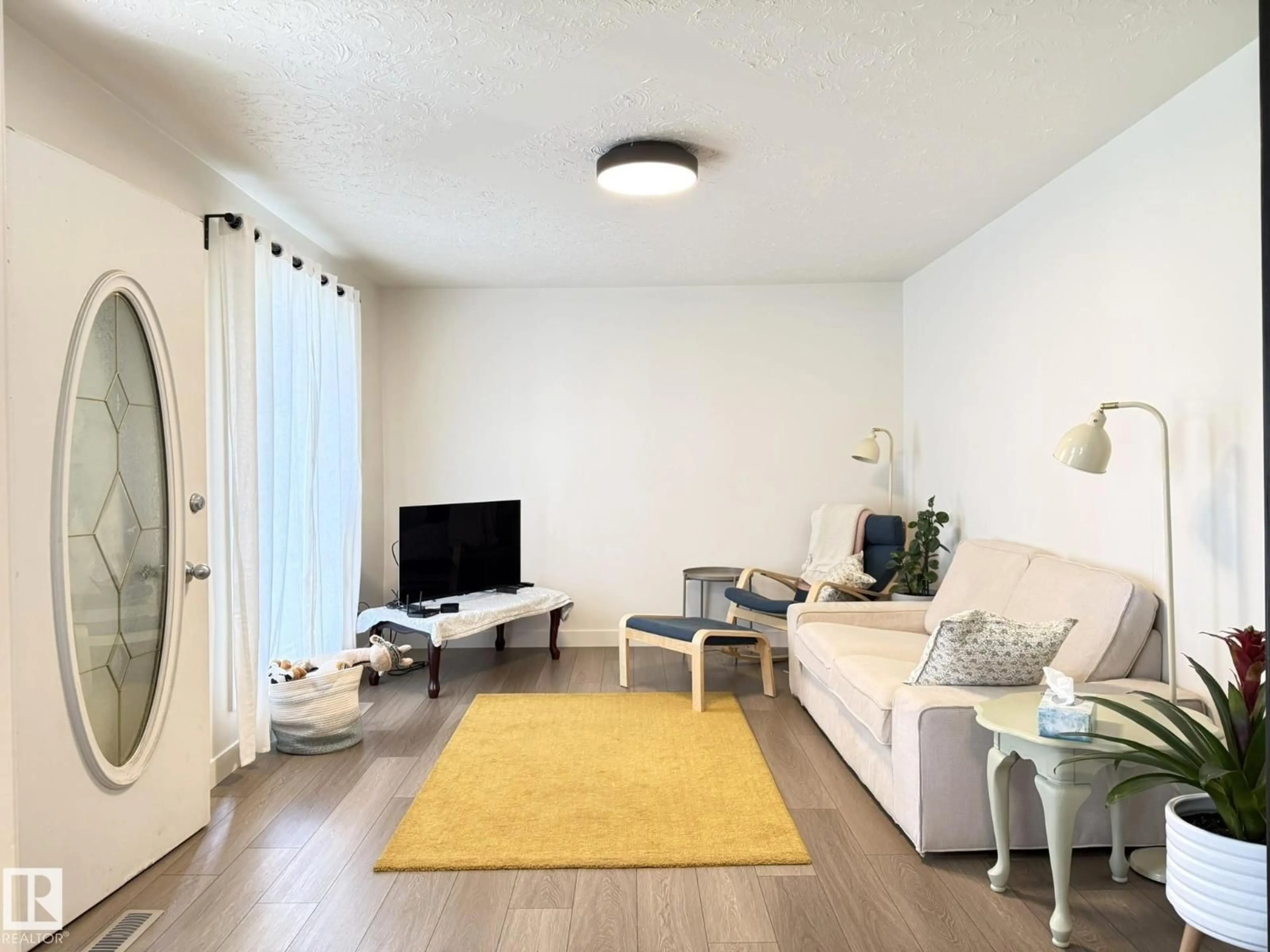 Living room with furniture, unknown for 11416 90 ST, Edmonton Alberta T5B3X7