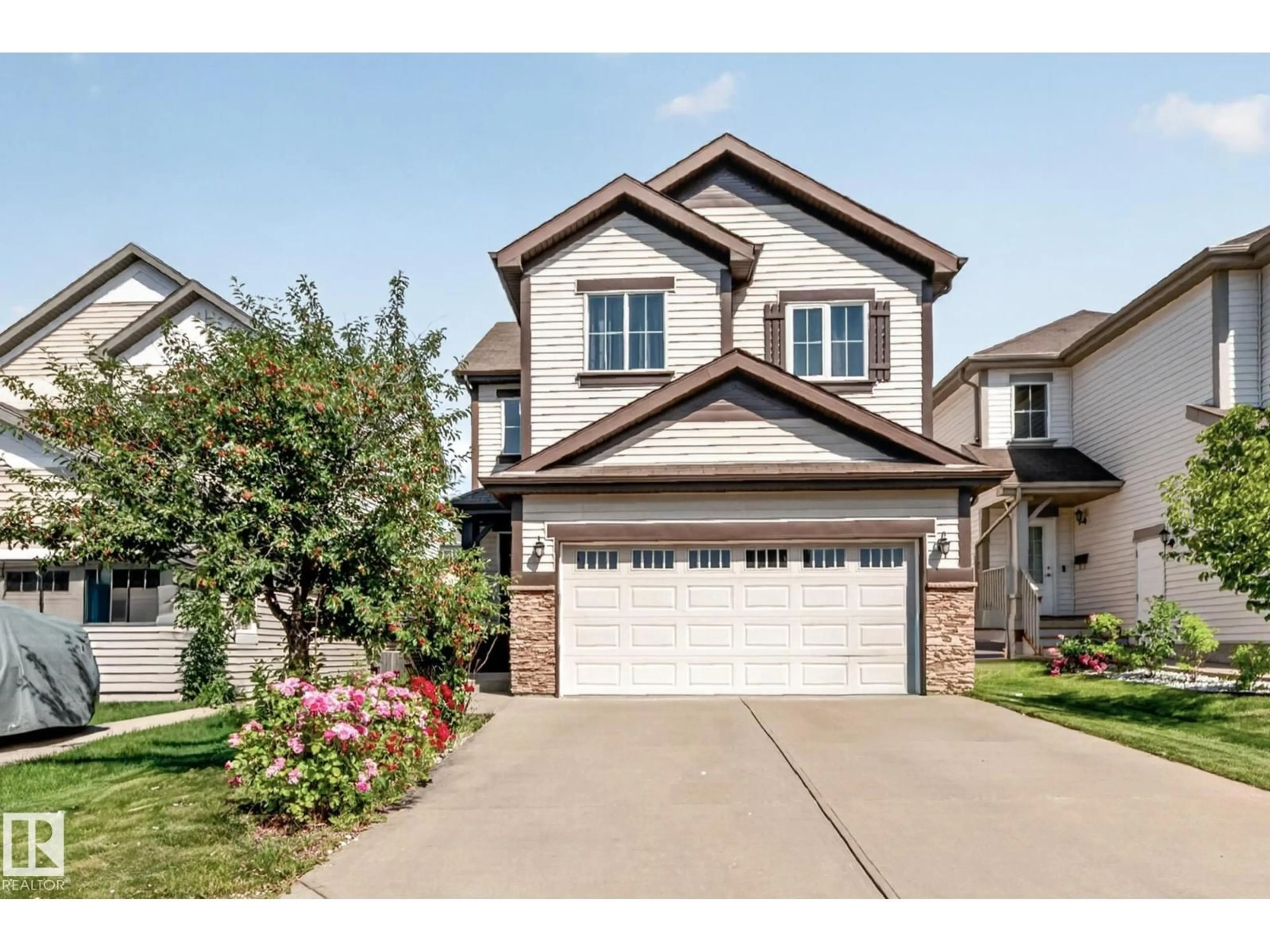 Home with vinyl exterior material, street for SW - 1115 61 ST, Edmonton Alberta T6X0M5