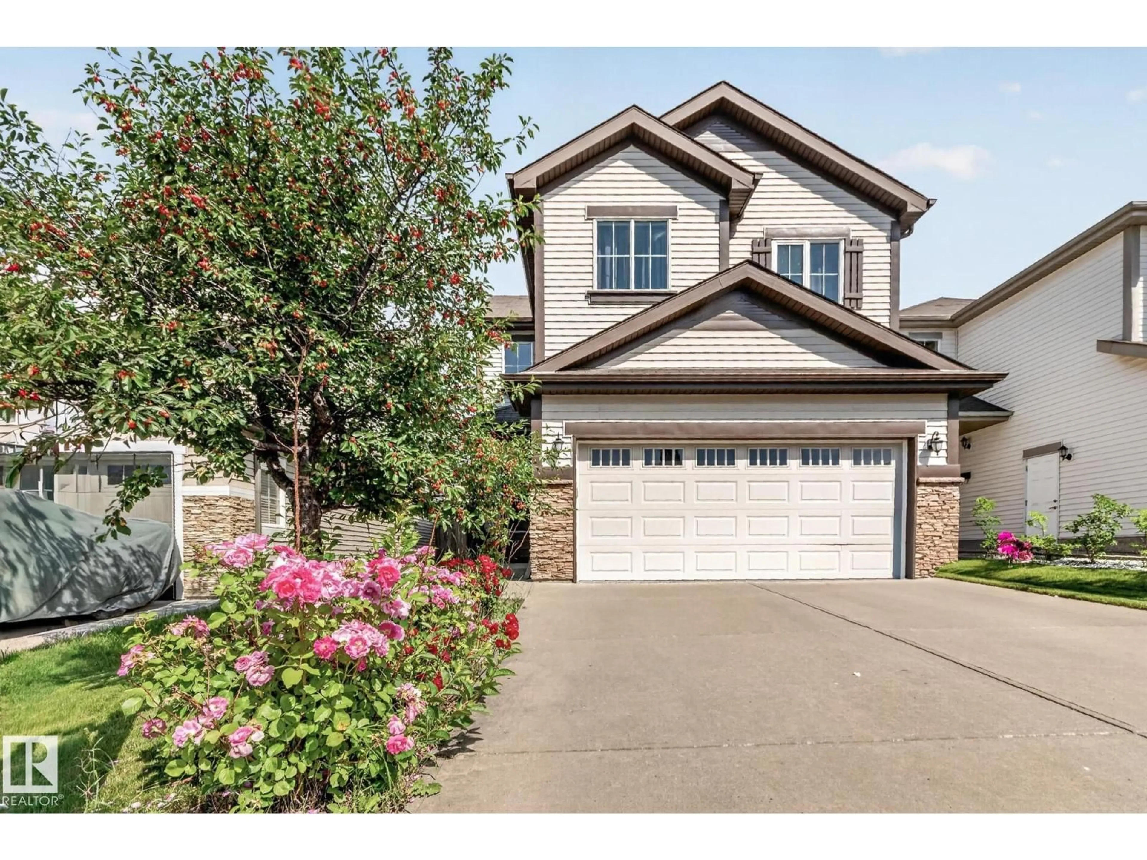 Home with vinyl exterior material, street for SW - 1115 61 ST, Edmonton Alberta T6X0M5