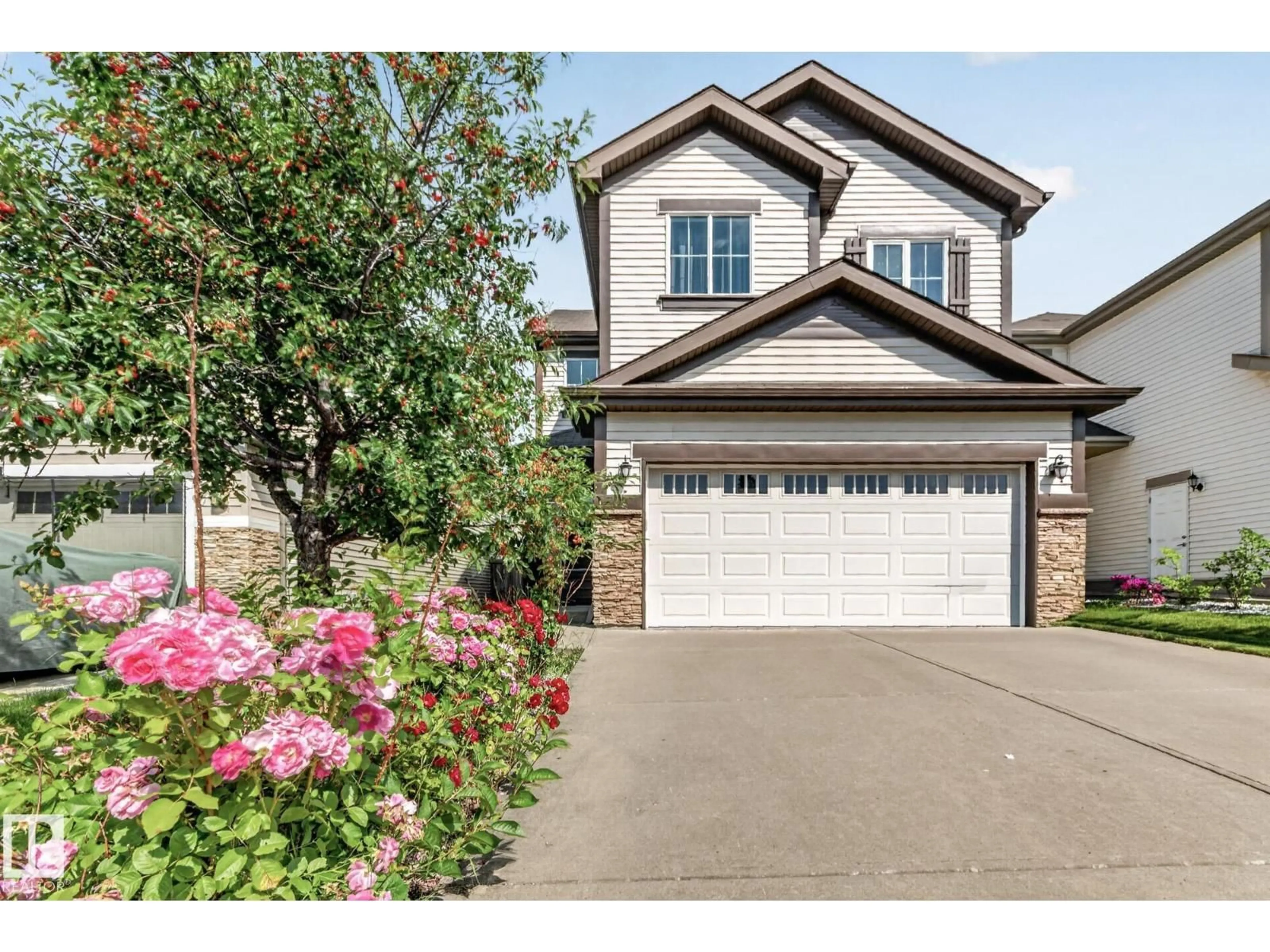 Home with vinyl exterior material, street for SW - 1115 61 ST, Edmonton Alberta T6X0M5