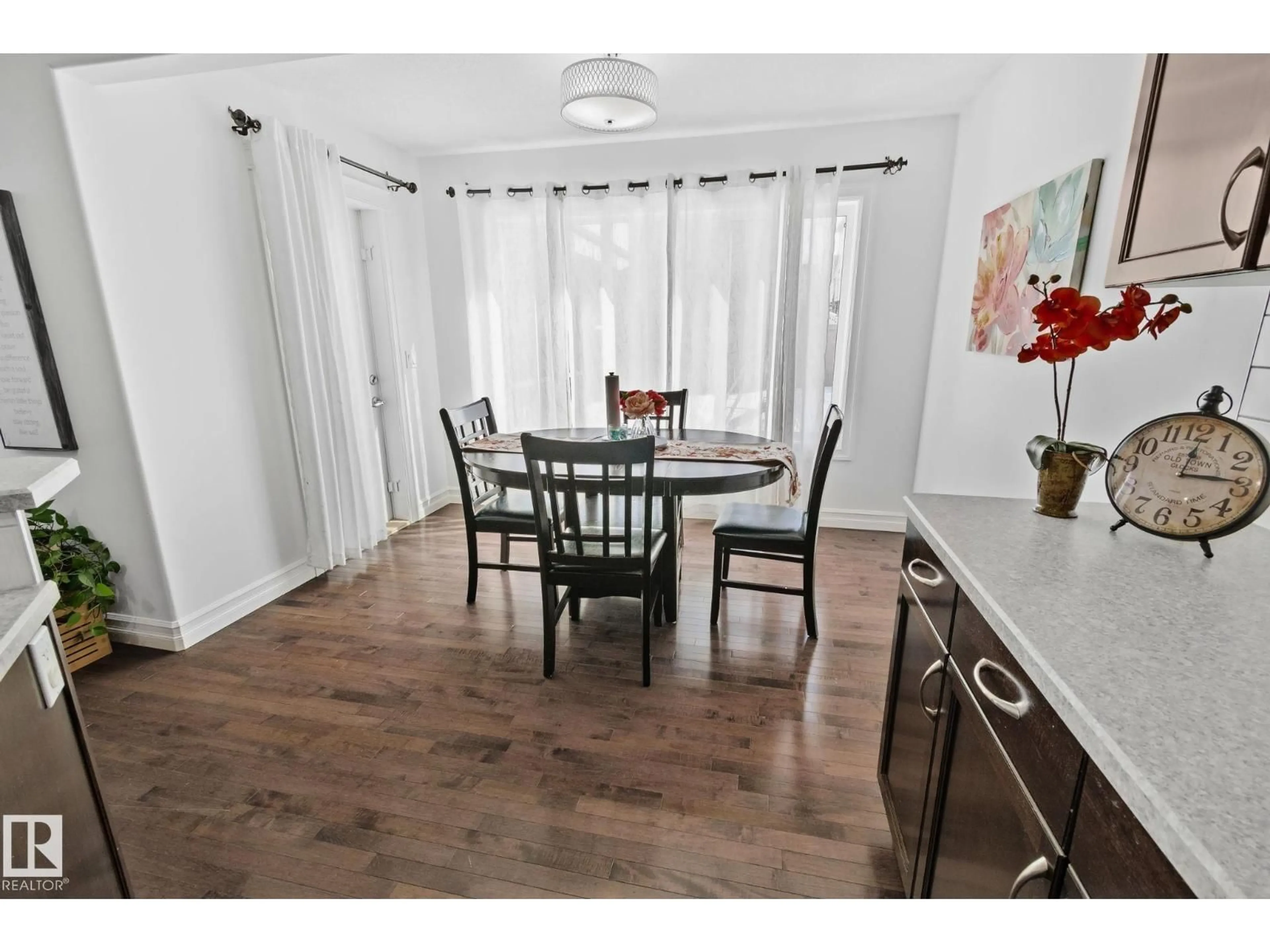Dining room, wood/laminate floor for SW - 1115 61 ST, Edmonton Alberta T6X0M5