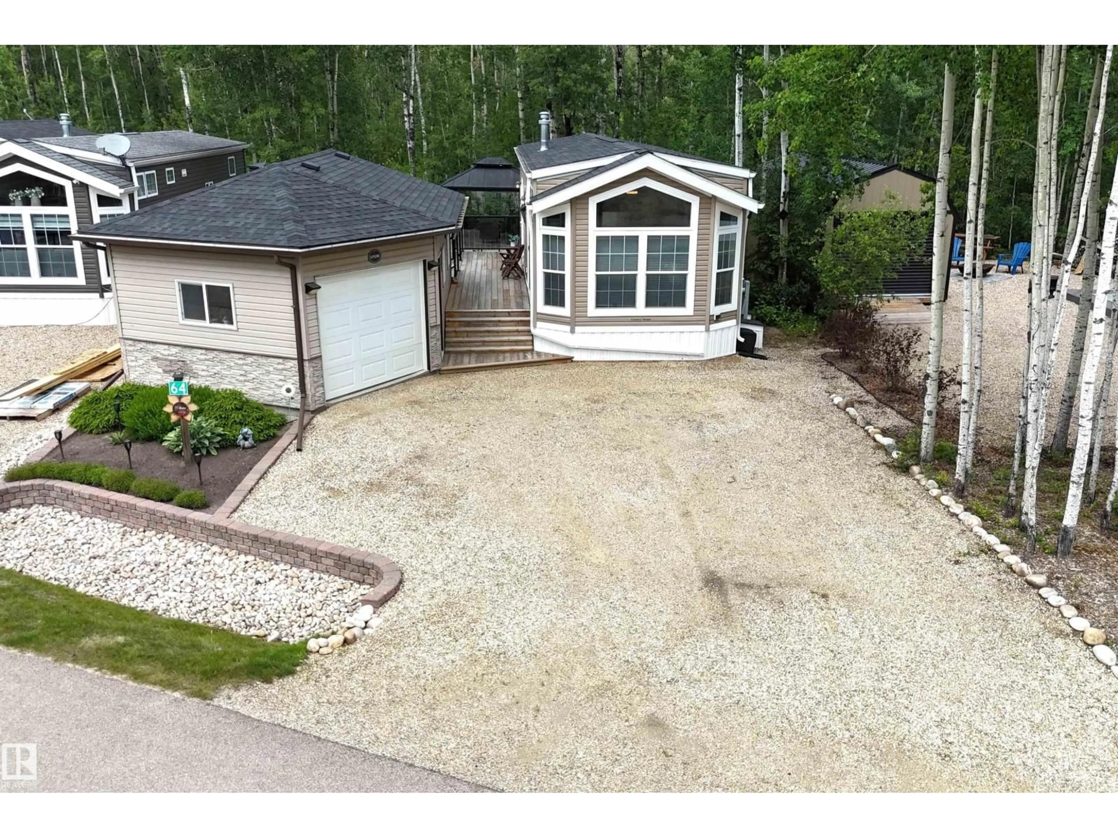 A pic from outside/outdoor area/front of a property/back of a property/a pic from drone, unknown for 64 RGE ROAD 55 A, Rural Parkland County Alberta T0E2B0