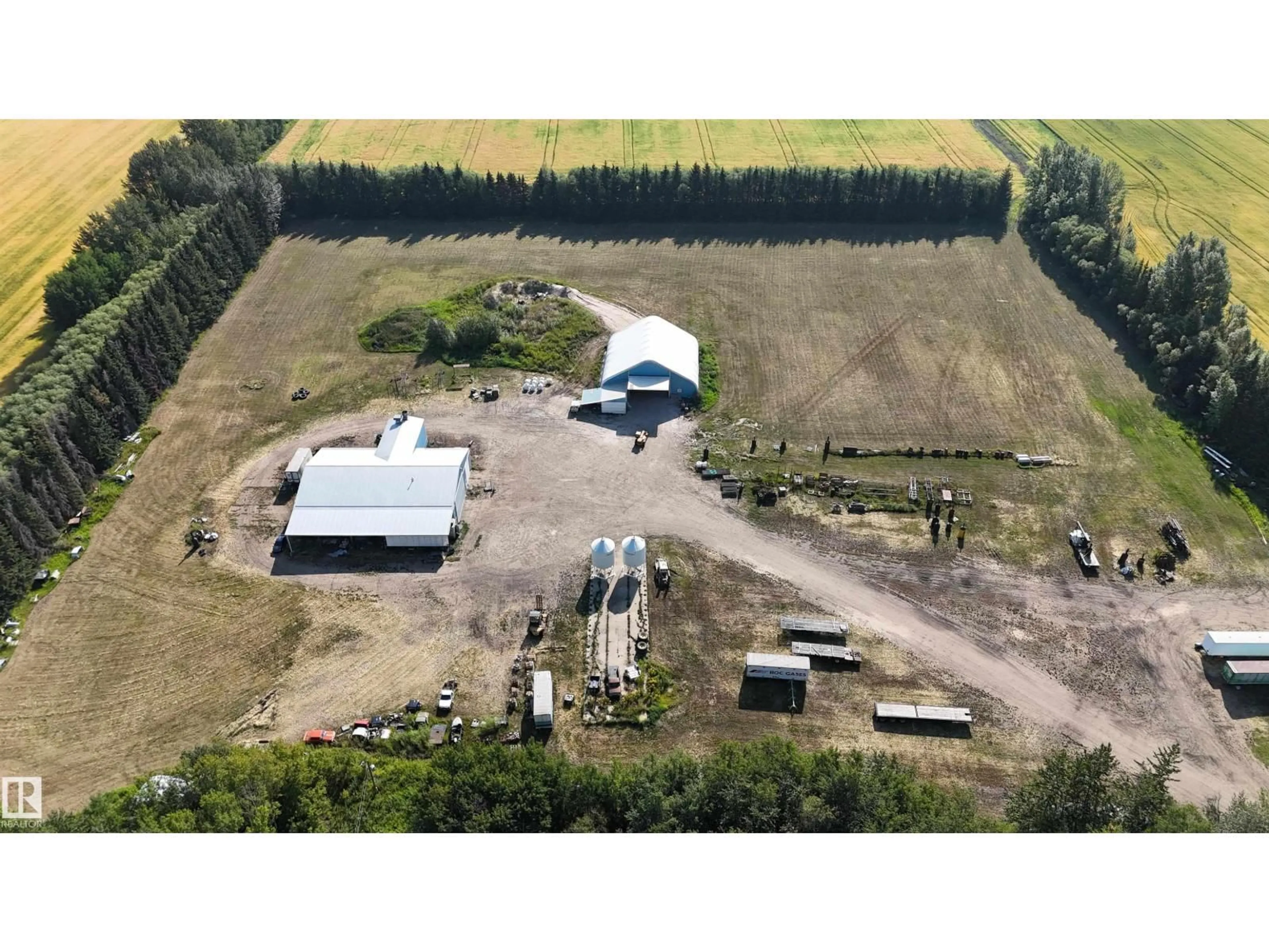 A pic from outside/outdoor area/front of a property/back of a property/a pic from drone, building for 61411 RGE ROAD 272, Rural Westlock County Alberta T7P2P4