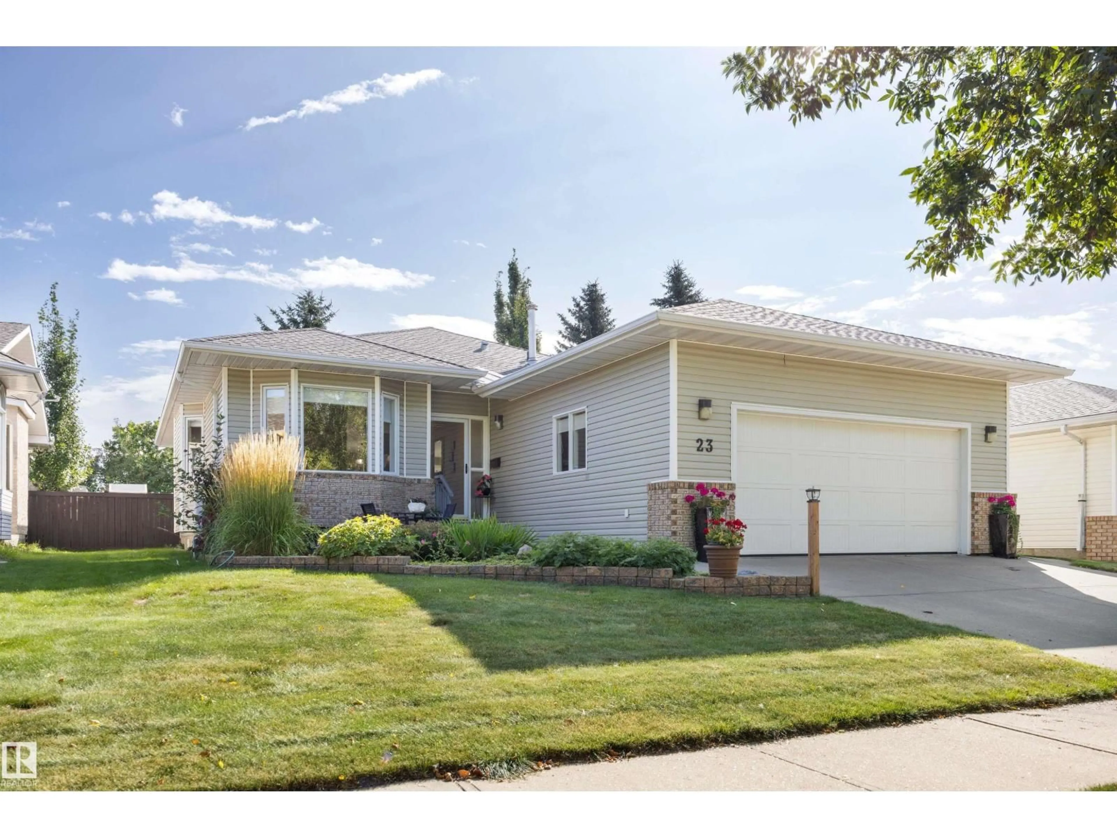 Home with vinyl exterior material, street for 23 HIGHLAND CR, Sherwood Park Alberta T8A5N8