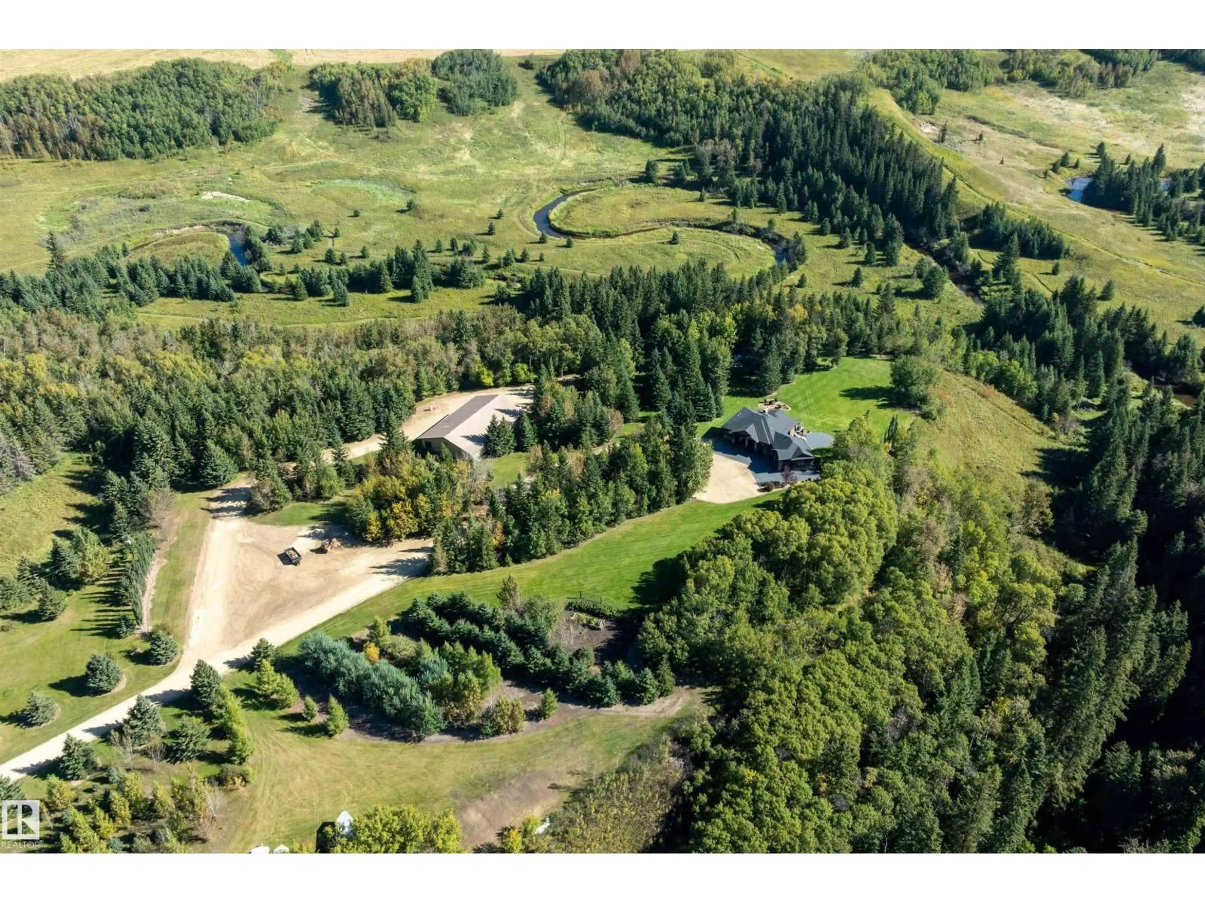 A pic from outside/outdoor area/front of a property/back of a property/a pic from drone, forest/trees view for 470015 RANGE ROAD 232, Rural Wetaskiwin County Alberta T9A1W9