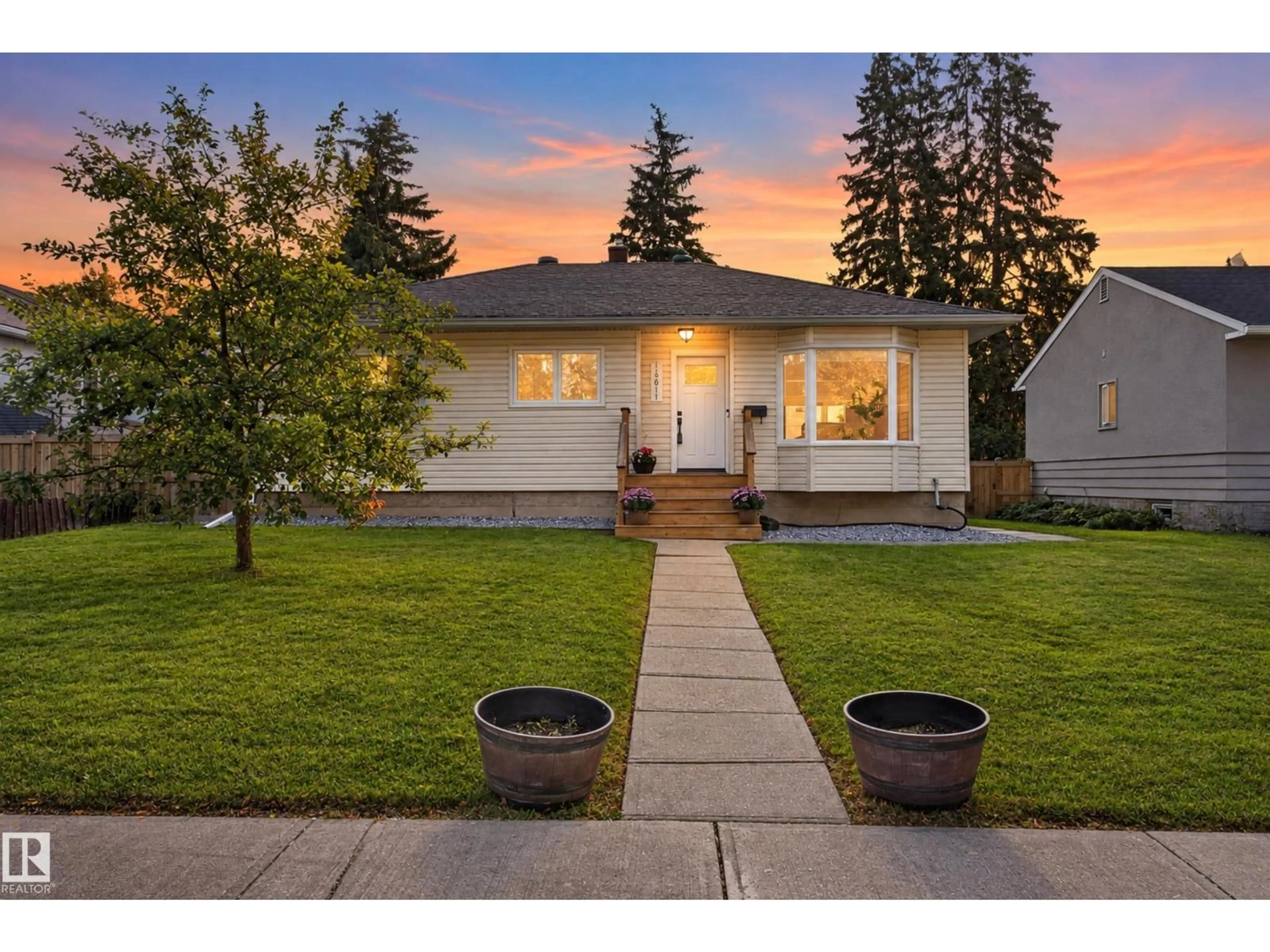 Home with vinyl exterior material, street for NW - 14611 109 AV, Edmonton Alberta T5N1H8