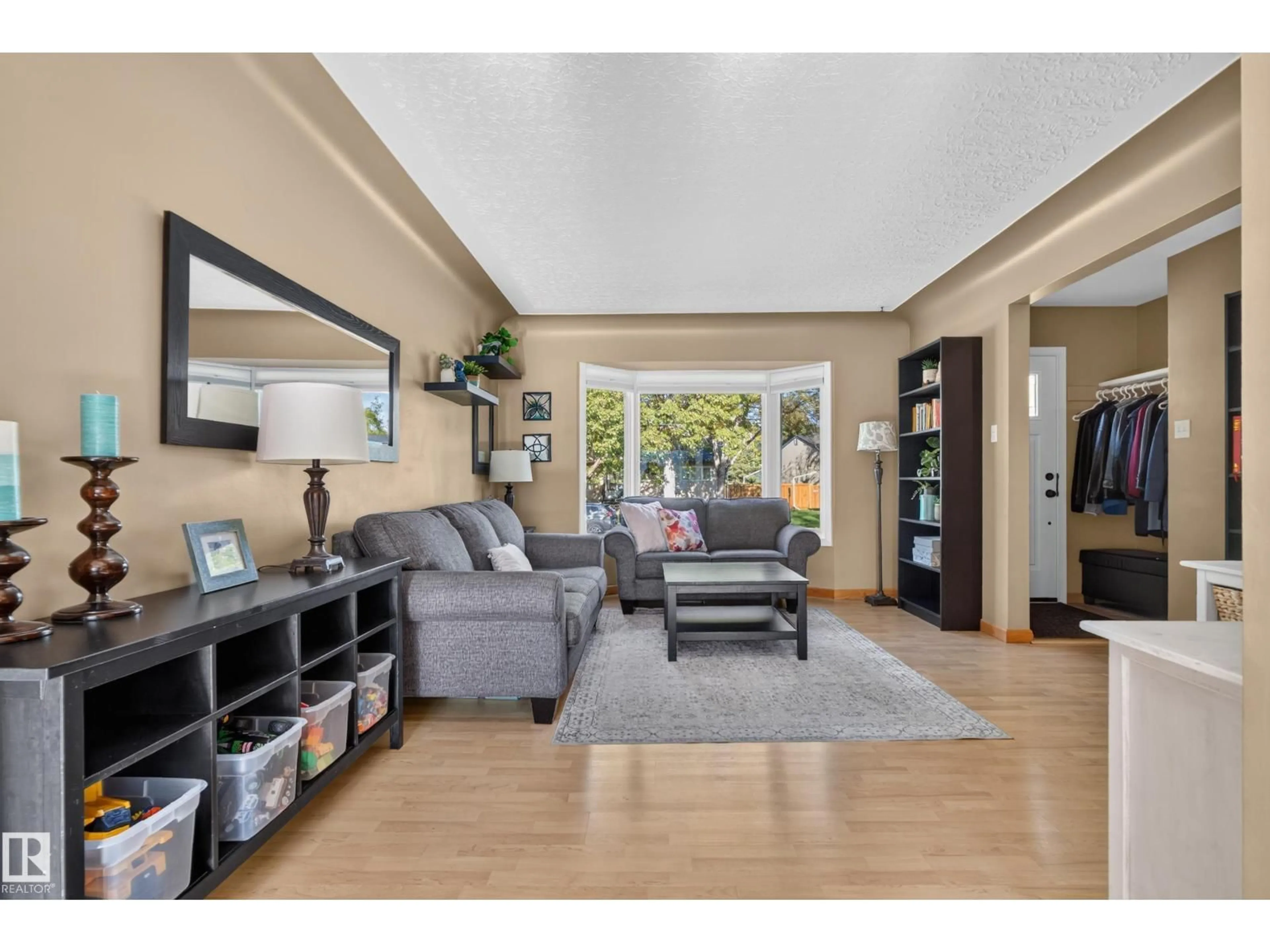 Living room with furniture, unknown for NW - 14611 109 AV, Edmonton Alberta T5N1H8