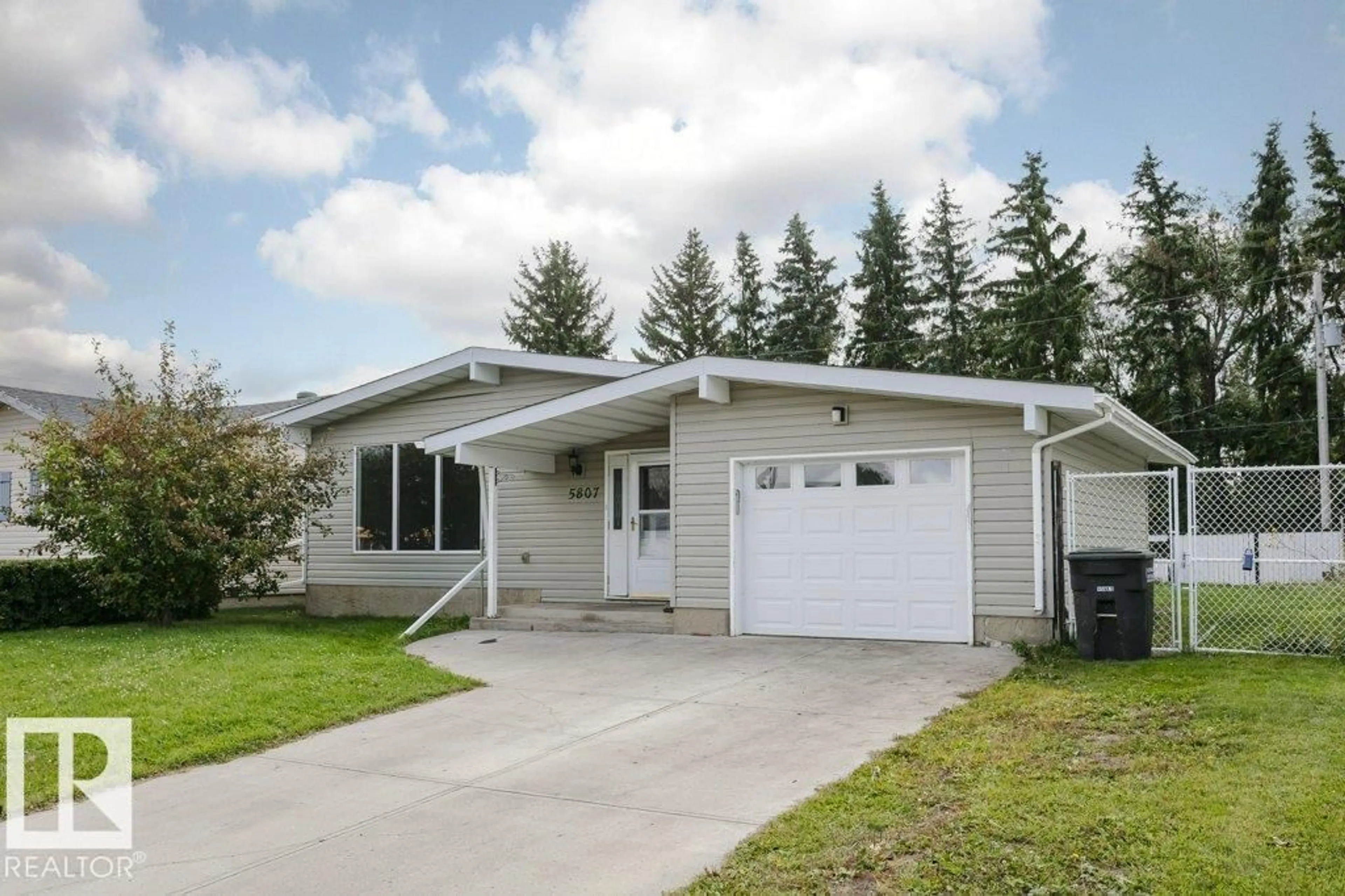 Home with vinyl exterior material, street for 5807 52 AV, Redwater Alberta T0A2W0