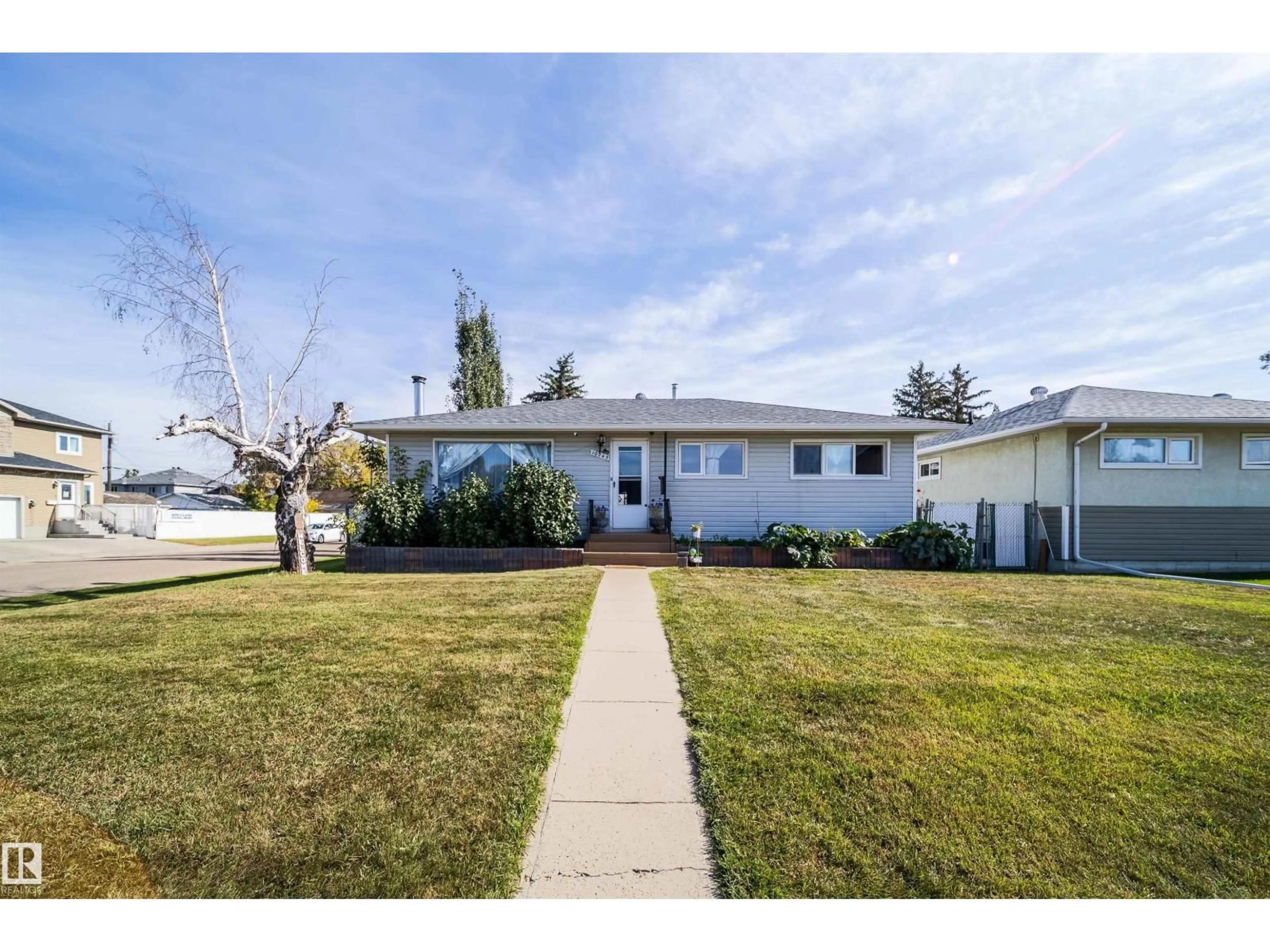 Home with vinyl exterior material, street for 10245 160 ST NW, Edmonton Alberta T5P3G1