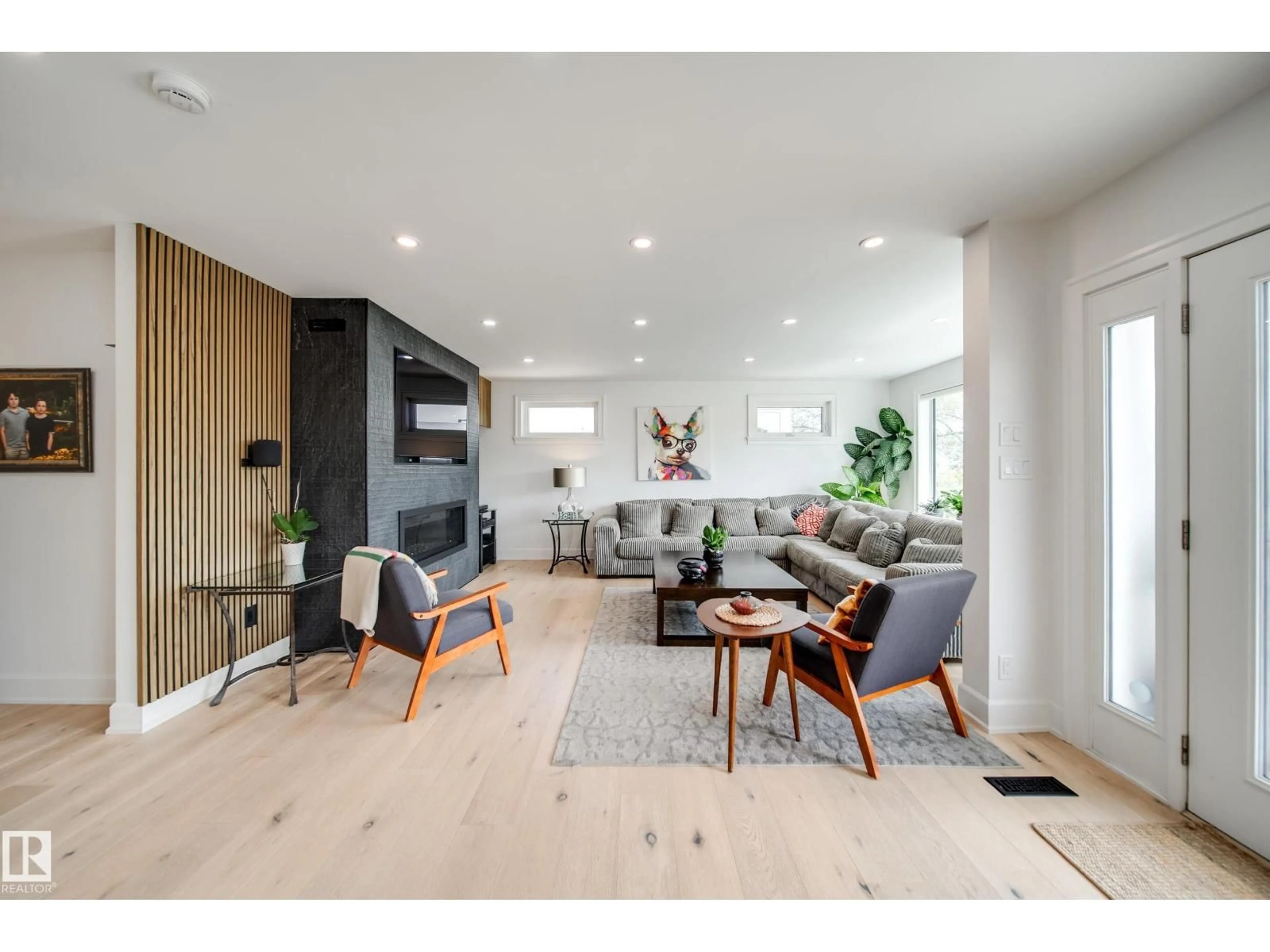 Living room with furniture, wood/laminate floor for 5310 ADA BV, Edmonton Alberta T5W4N7