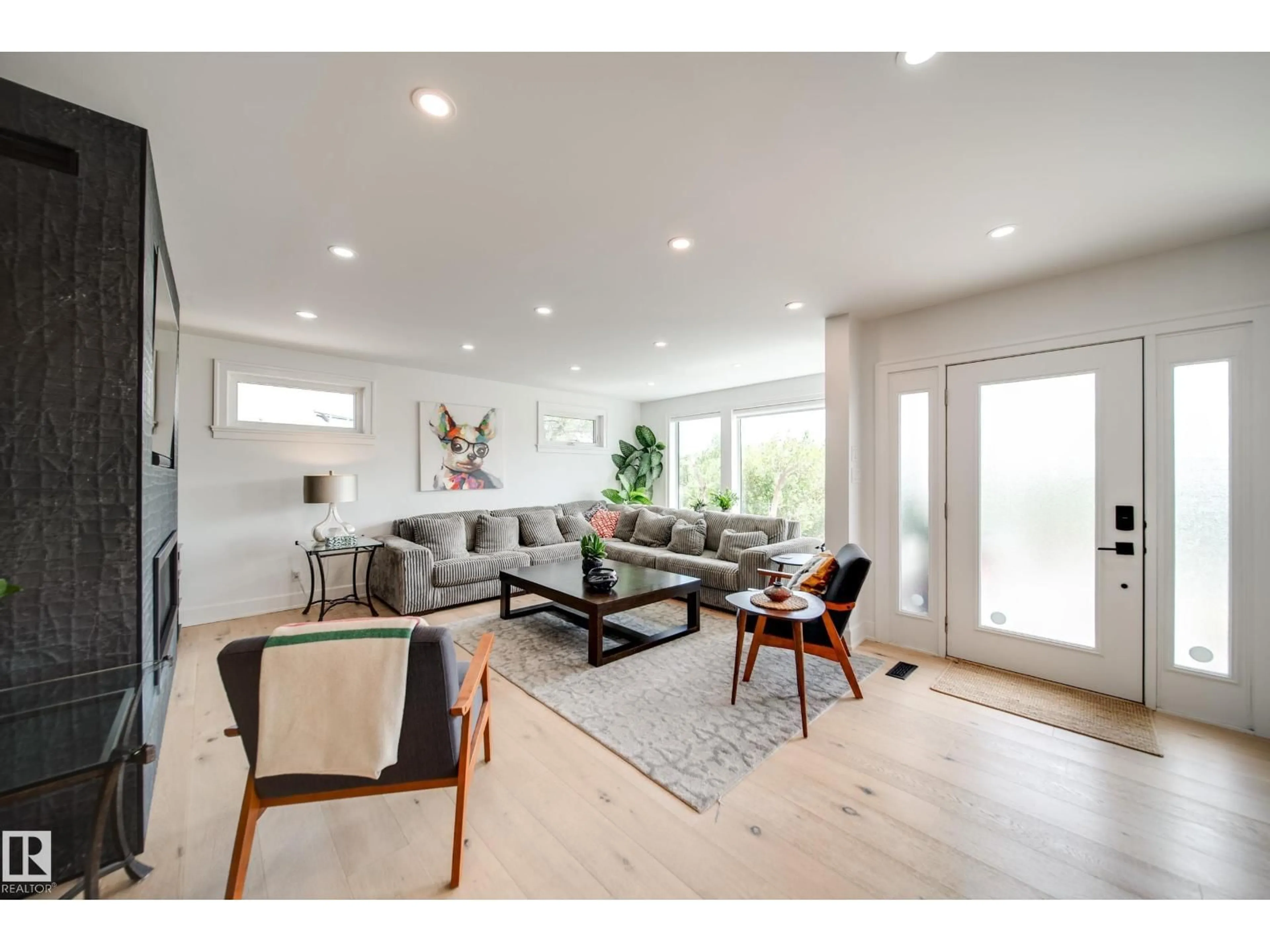 Living room with furniture, wood/laminate floor for 5310 ADA BV, Edmonton Alberta T5W4N7