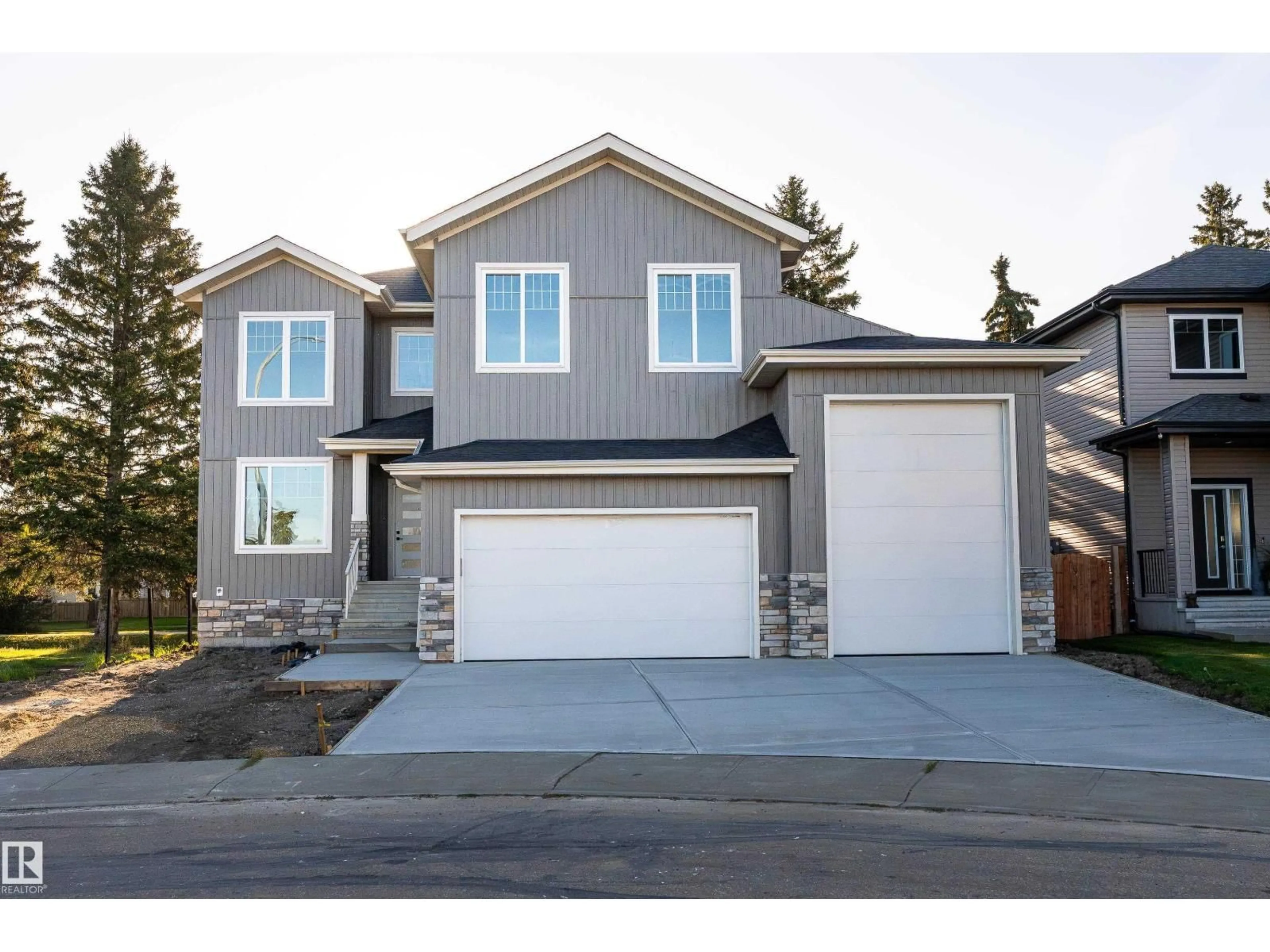 Home with vinyl exterior material, street for 5313 BON ACRES CR, Bon Accord Alberta T0A0K0