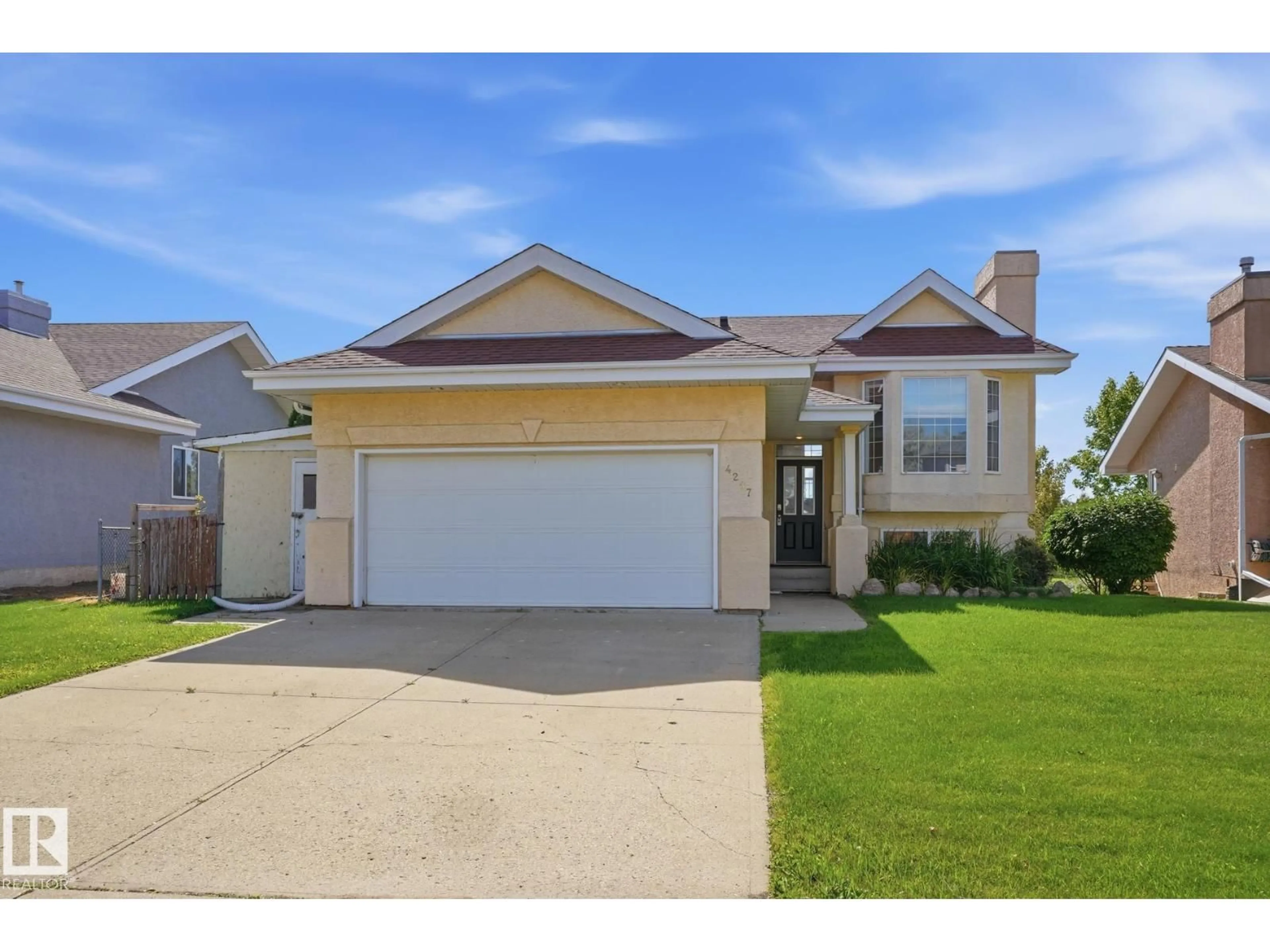 Home with vinyl exterior material, street for 4207 43 AV, Beaumont Alberta T4X1M5