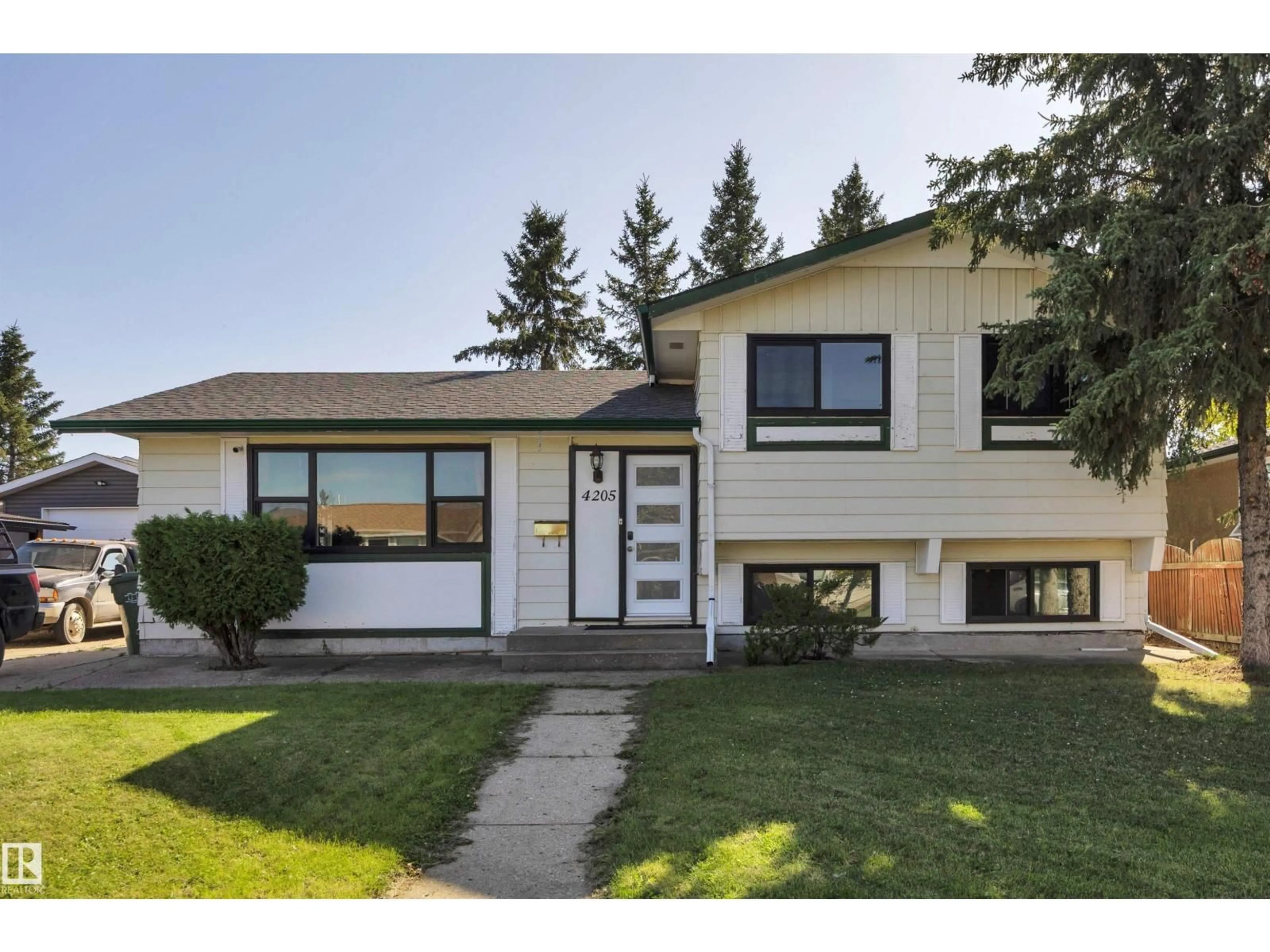 Home with vinyl exterior material, street for 4205 37 AV, Leduc Alberta T9E6A5