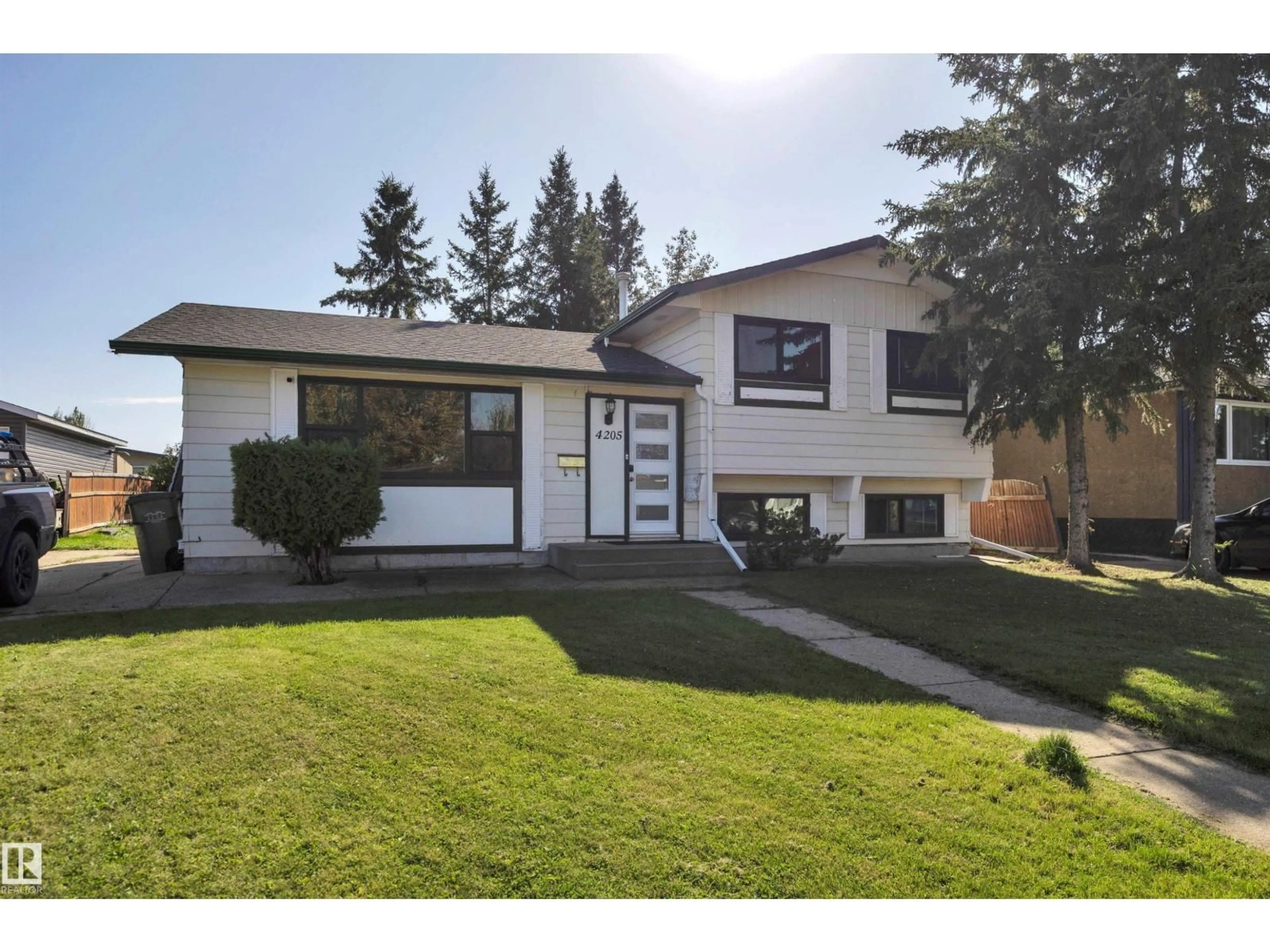 Home with vinyl exterior material, street for 4205 37 AV, Leduc Alberta T9E6A5