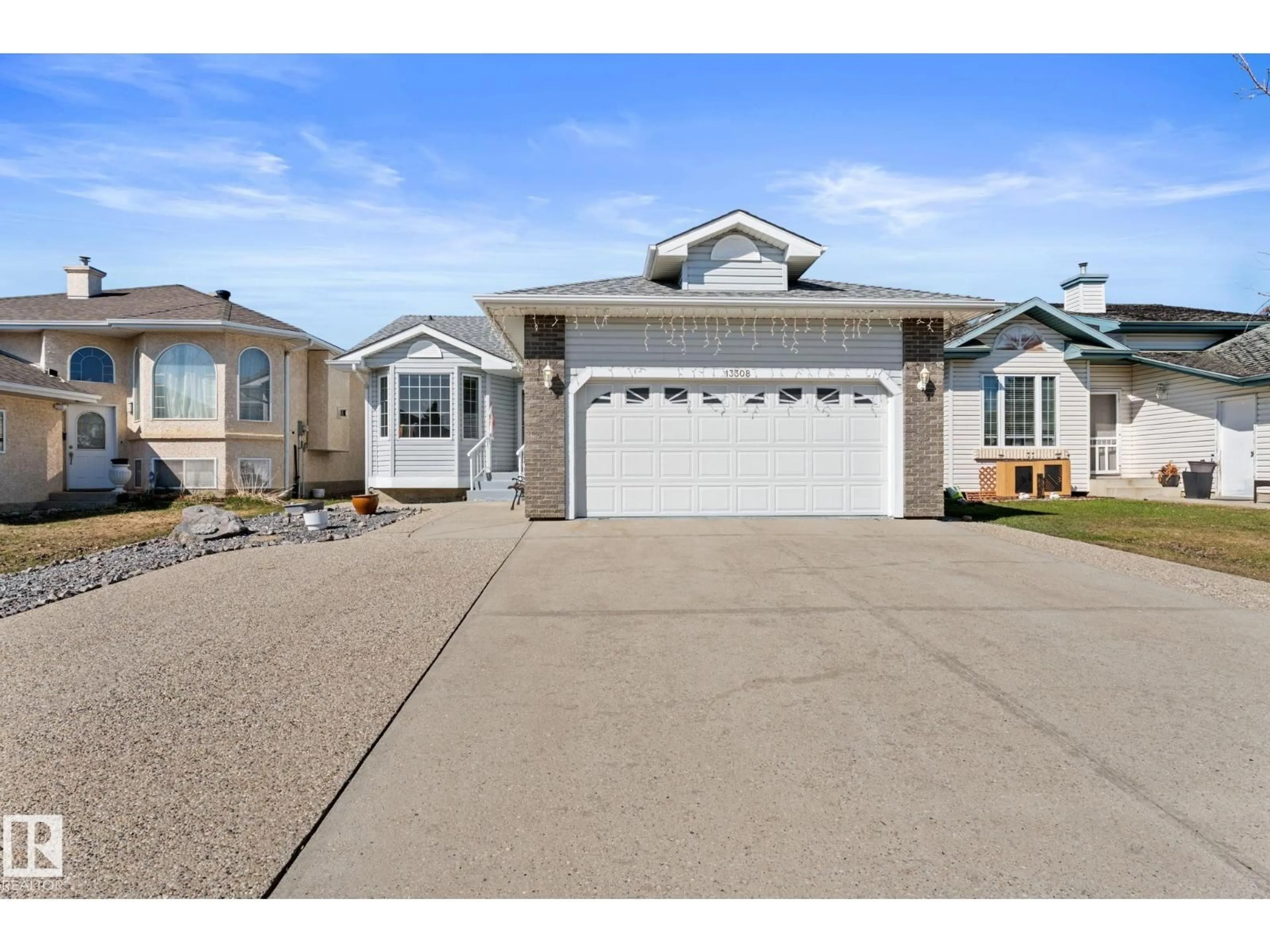 Home with vinyl exterior material, street for NW - 13308 155 AV, Edmonton Alberta T6V1G4