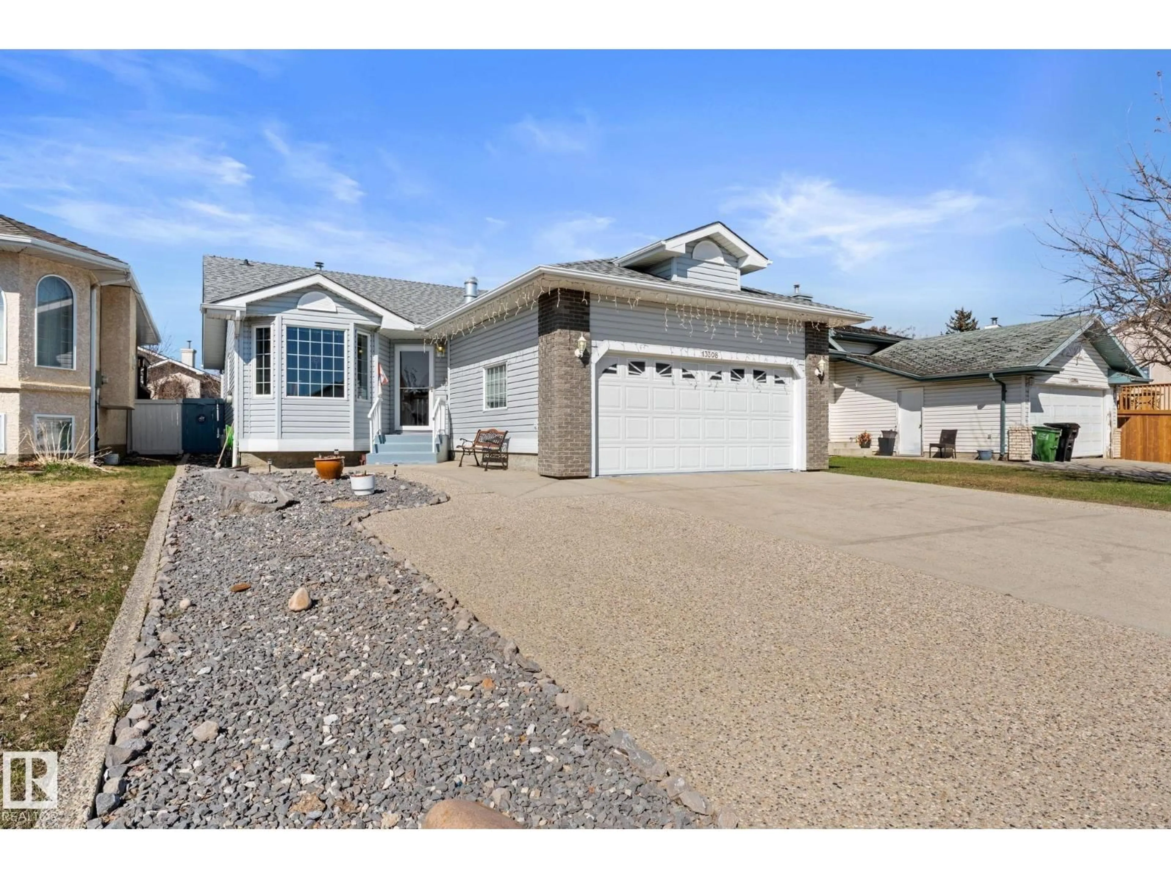 Home with vinyl exterior material, street for NW - 13308 155 AV, Edmonton Alberta T6V1G4