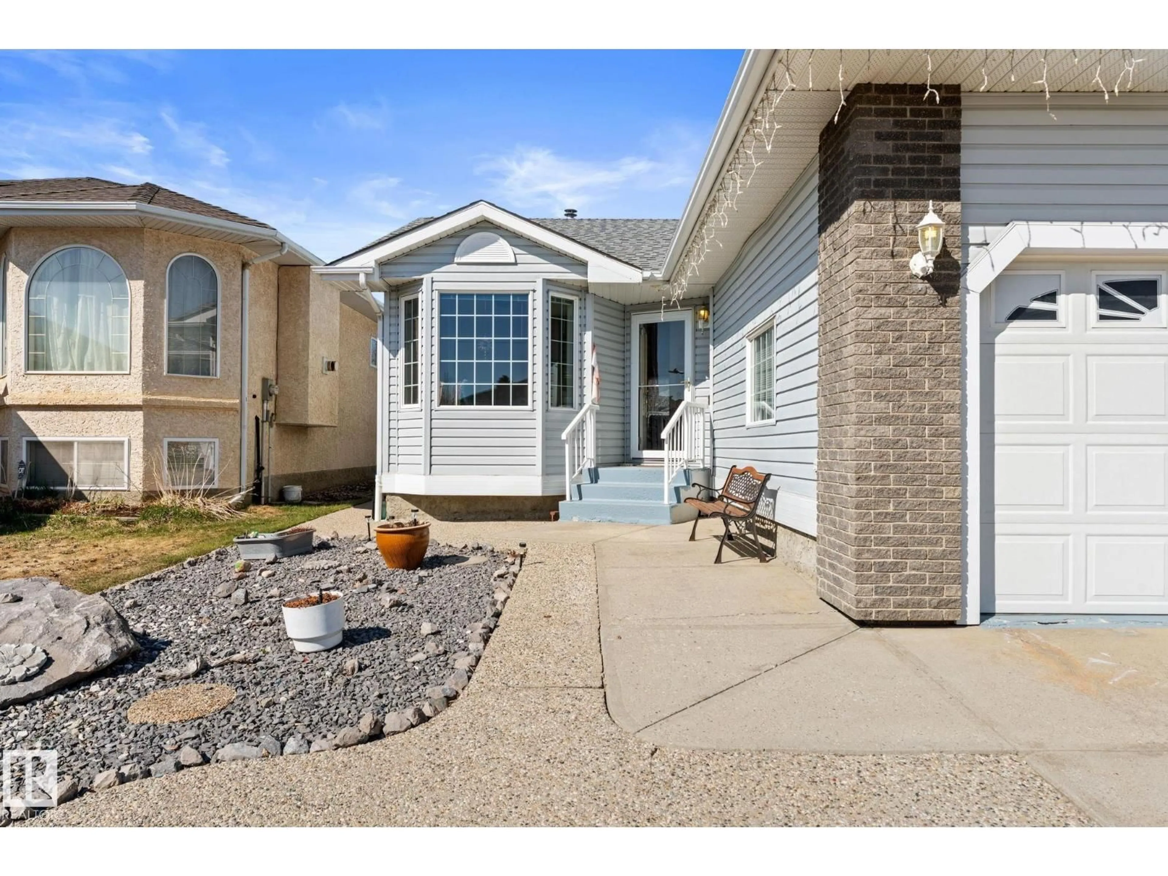 Home with vinyl exterior material, street for NW - 13308 155 AV, Edmonton Alberta T6V1G4