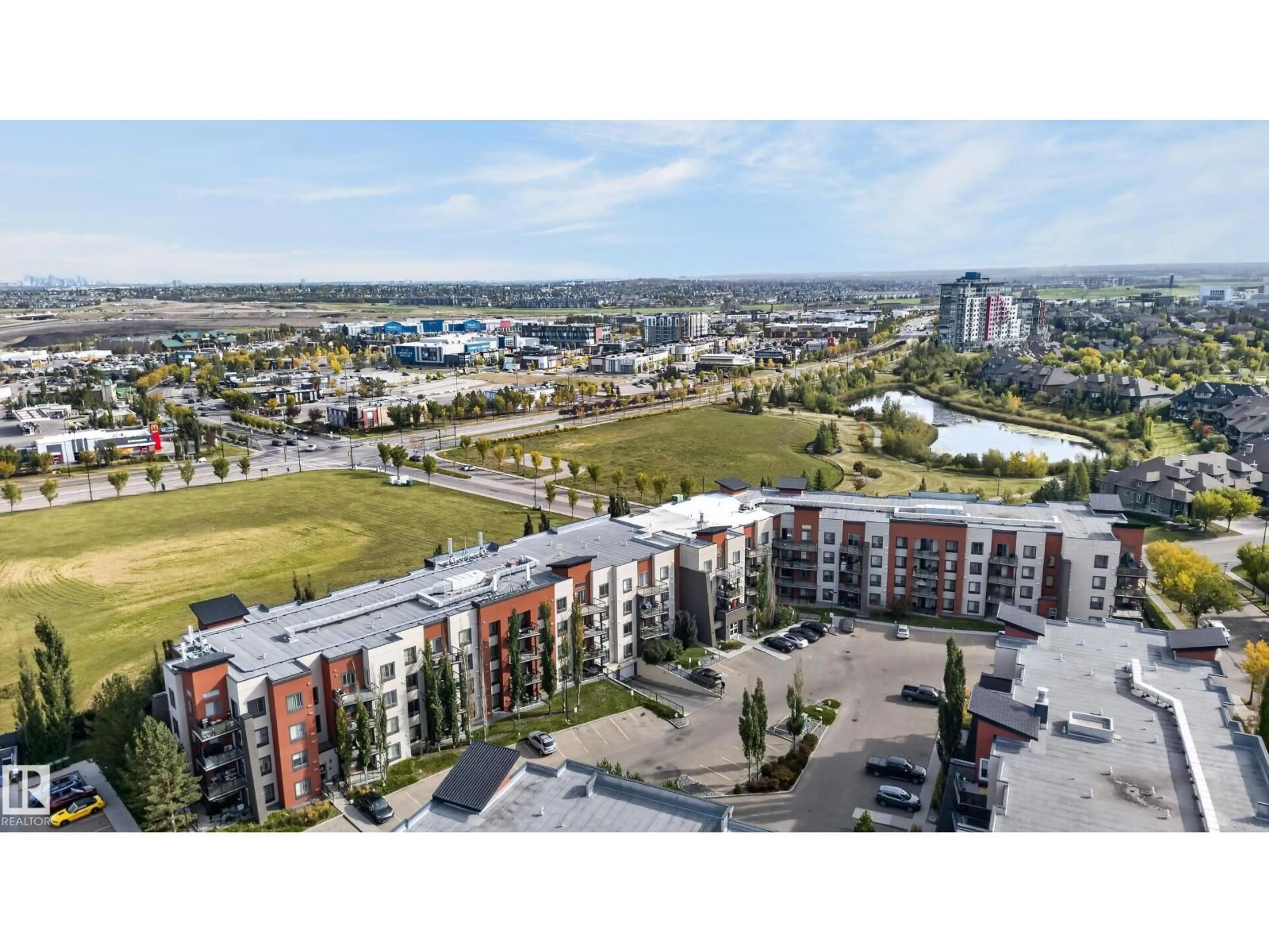 A pic from outside/outdoor area/front of a property/back of a property/a pic from drone, city buildings view from balcony for #411 - 304 AMBLESIDE LINK, Edmonton Alberta T6W0V2