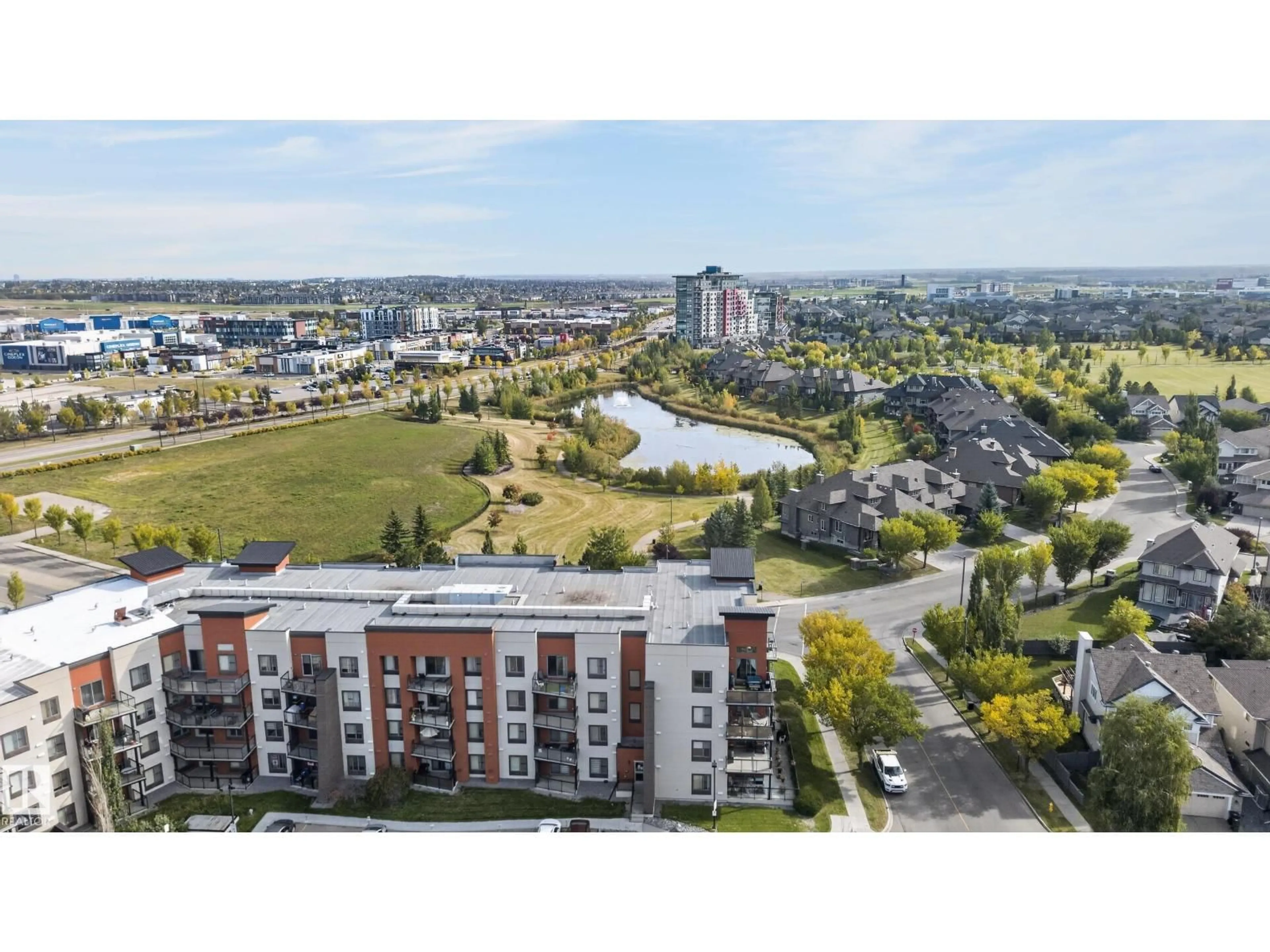 A pic from outside/outdoor area/front of a property/back of a property/a pic from drone, city buildings view from balcony for #411 - 304 AMBLESIDE LINK, Edmonton Alberta T6W0V2