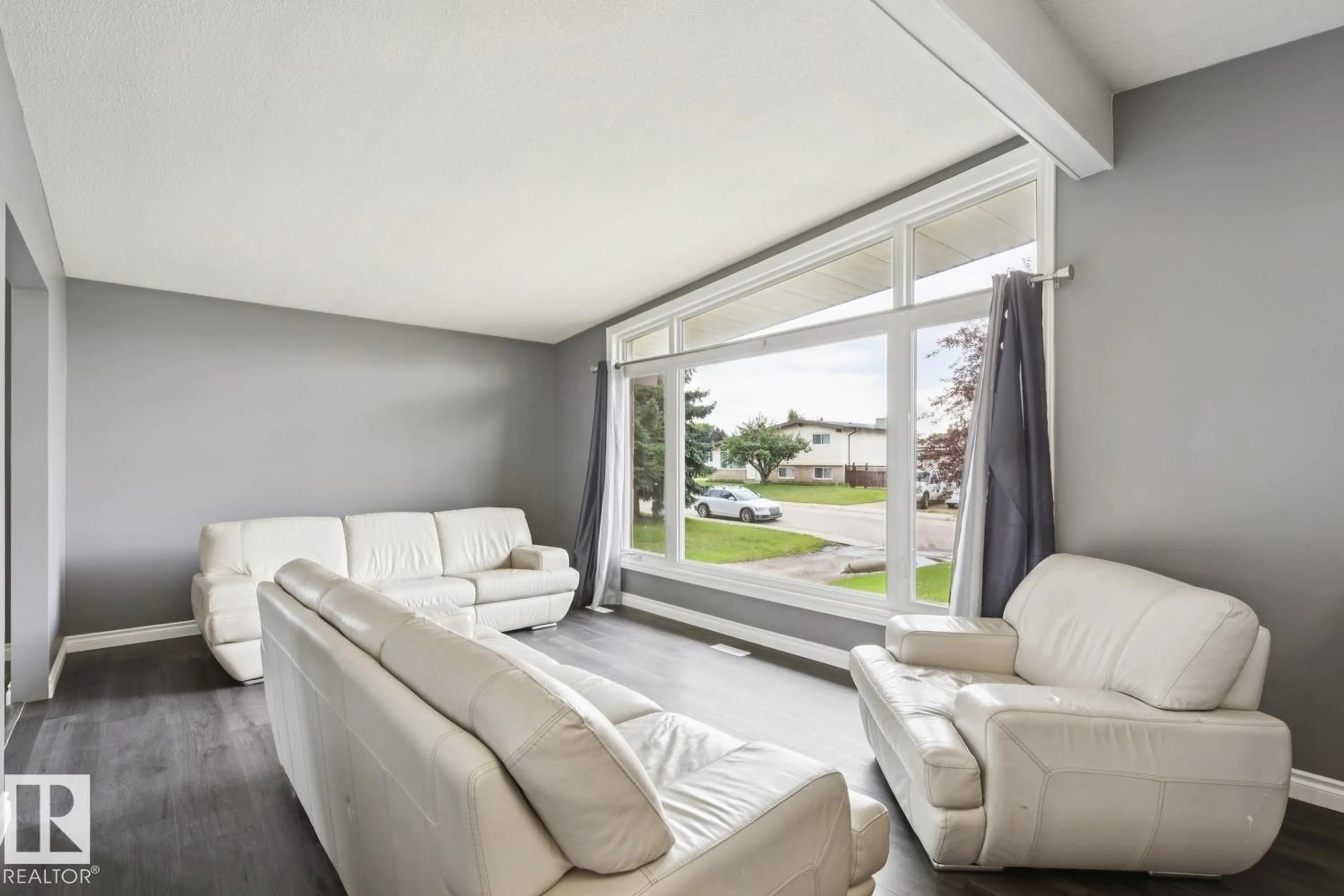 Living room with furniture, unknown for NW - 9312 151 AV, Edmonton Alberta T5E2P9