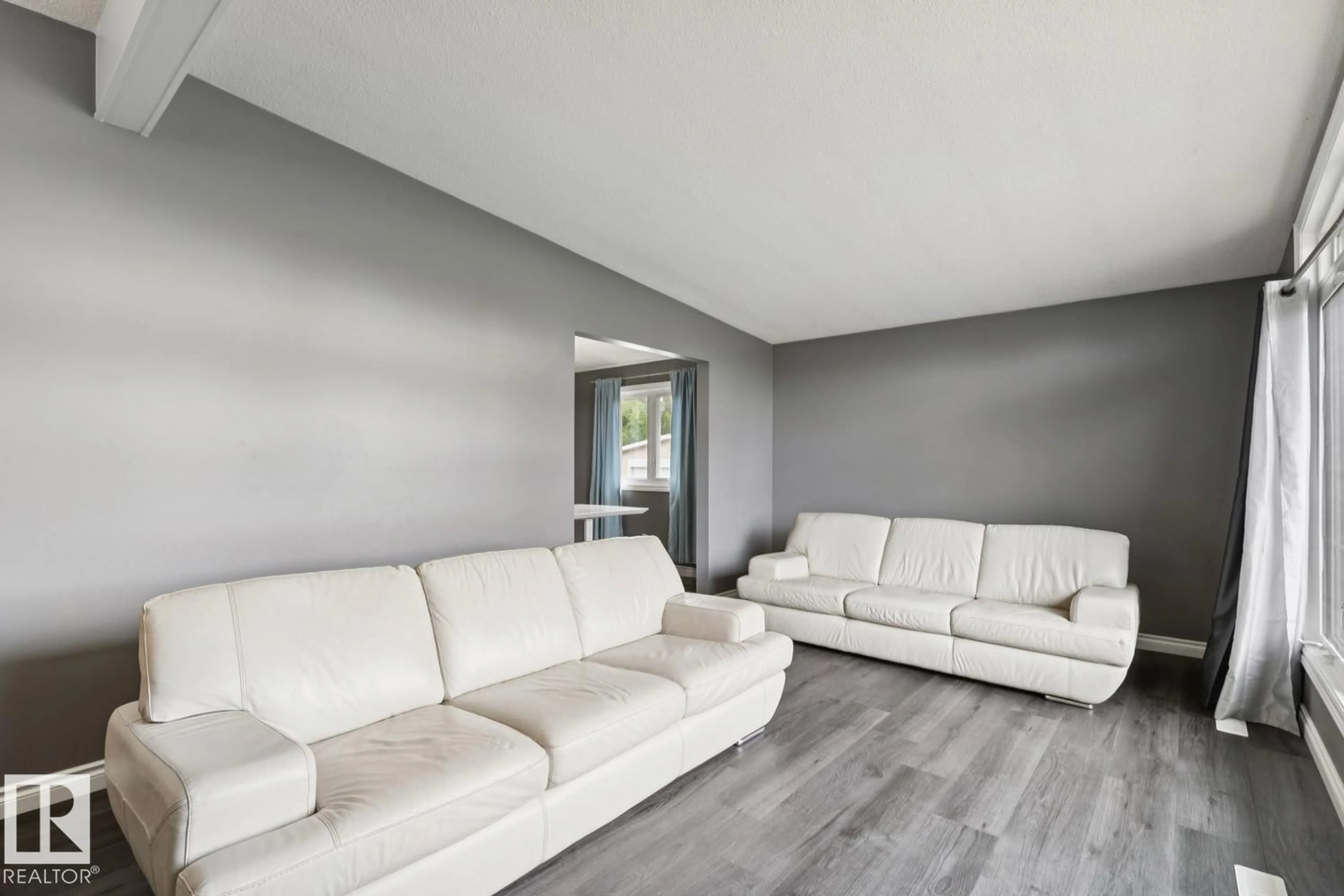 Living room with furniture, unknown for NW - 9312 151 AV, Edmonton Alberta T5E2P9