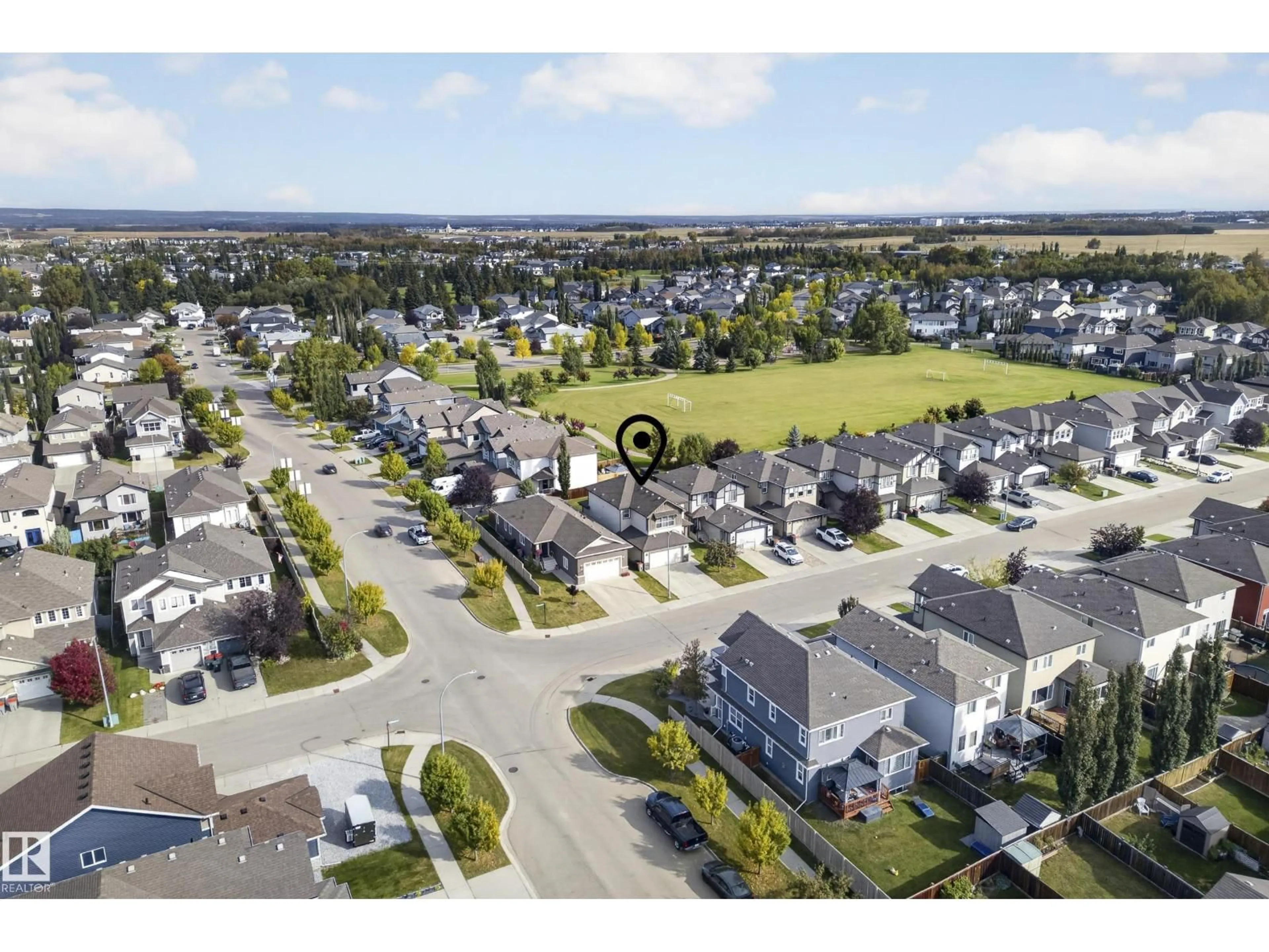 A pic from outside/outdoor area/front of a property/back of a property/a pic from drone, street for 1023 SOUTH CREEK WD, Stony Plain Alberta T7Z0C9