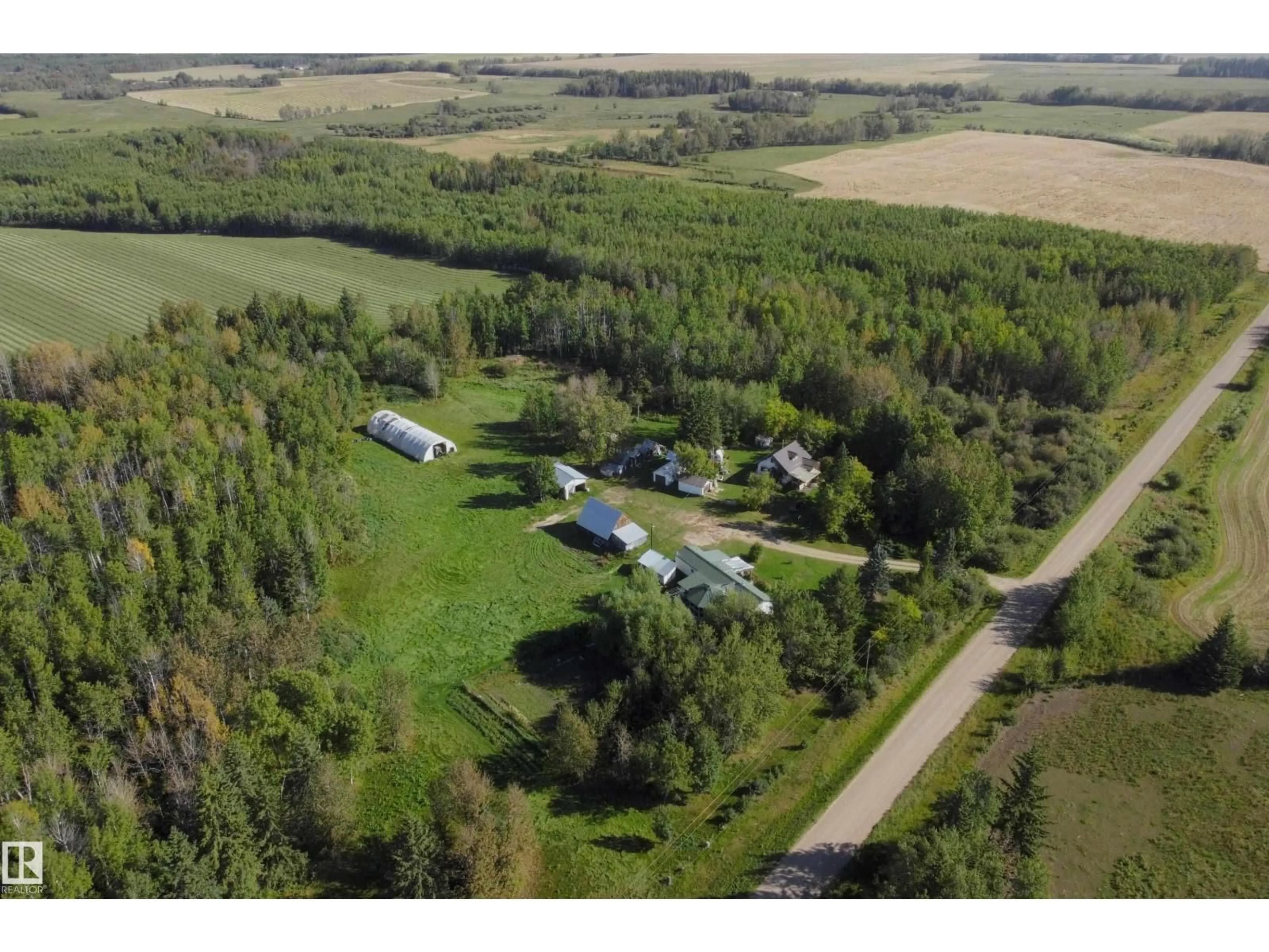 A pic from outside/outdoor area/front of a property/back of a property/a pic from drone, unknown for 763 HWY 763, Rural Barrhead County Alberta T7N1N3