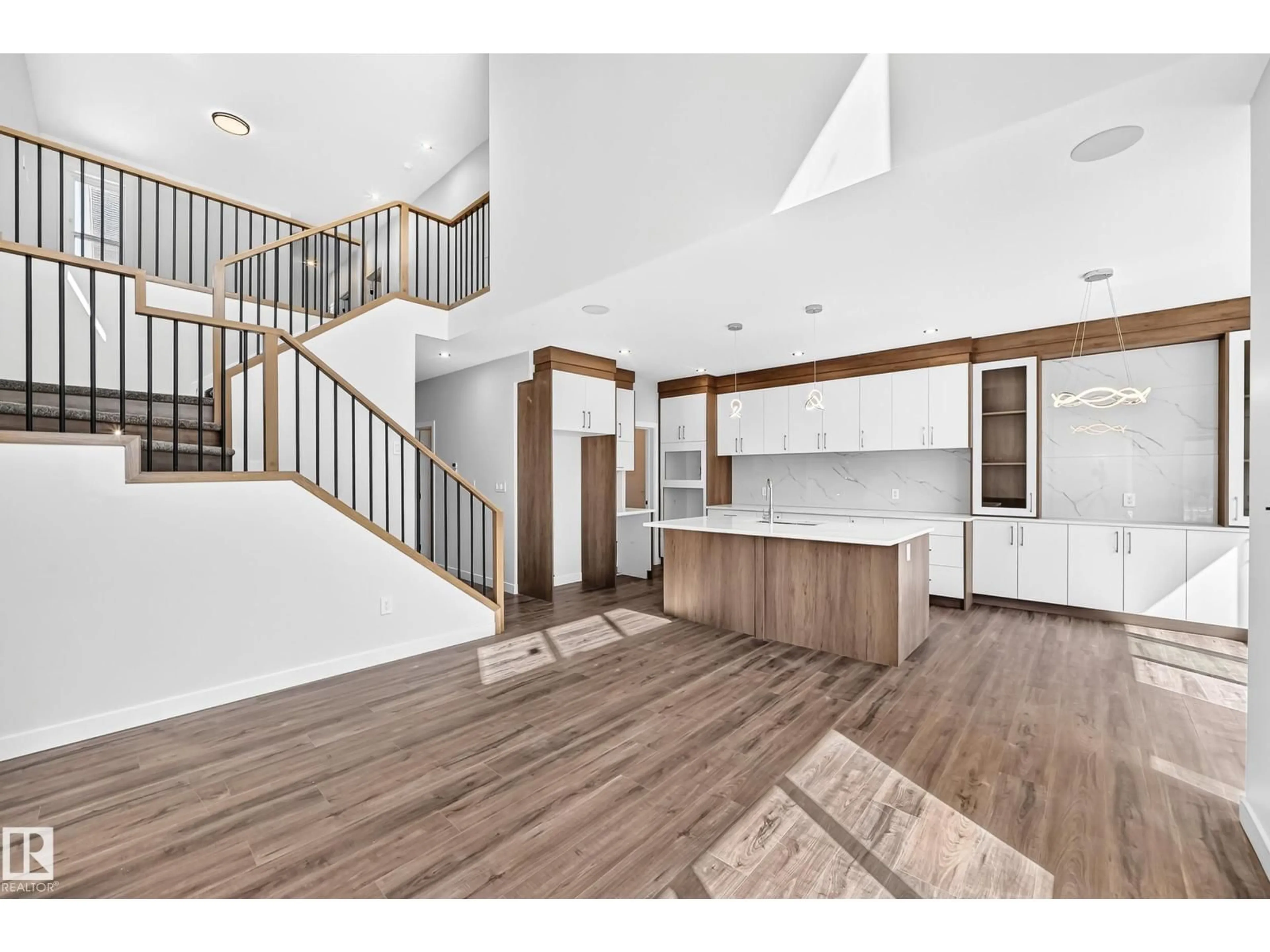 Open concept kitchen, wood/laminate floor for 19 TEAKWOOD TC, Spruce Grove Alberta T7X4S9