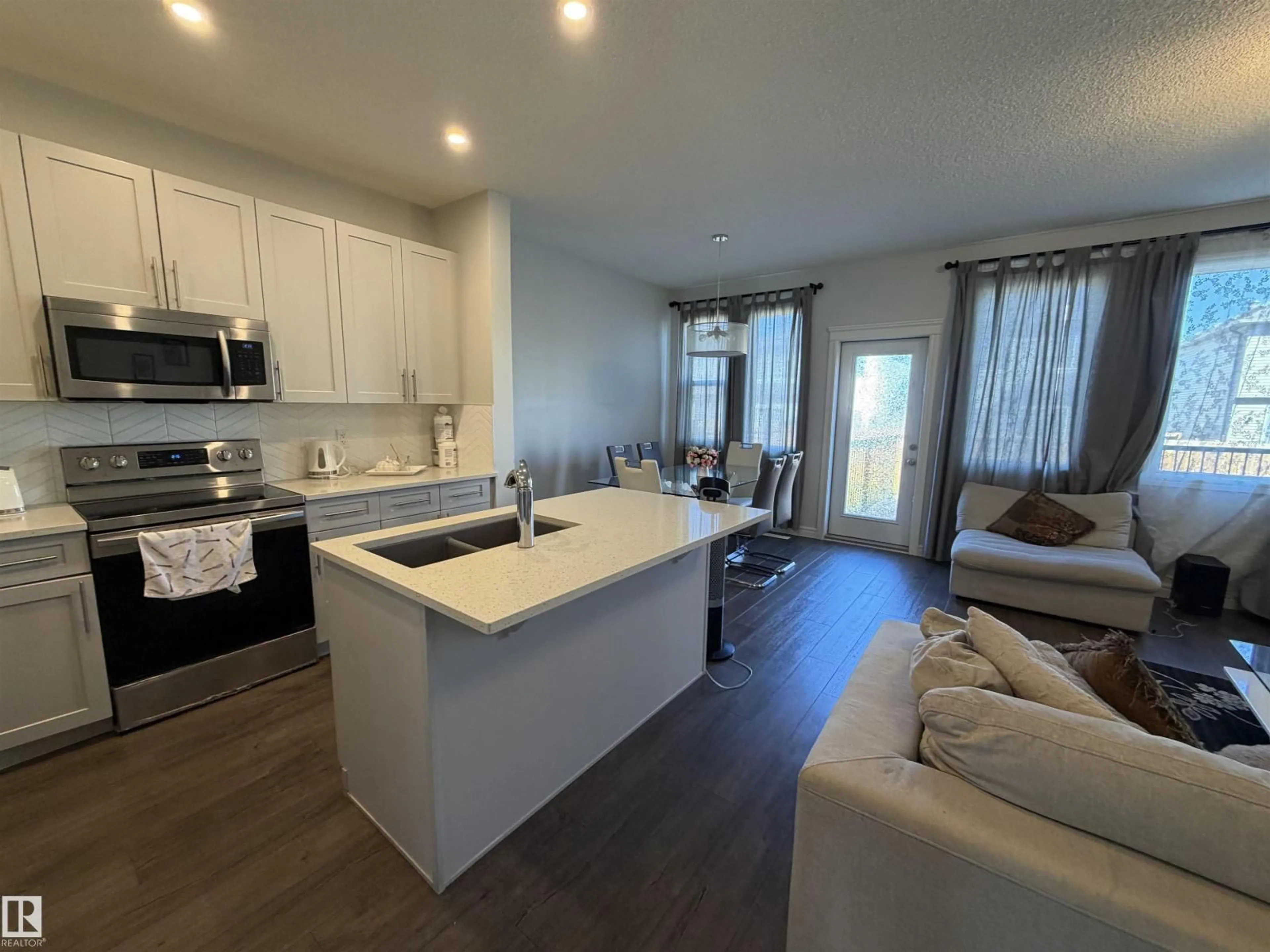 Open concept kitchen, unknown for 2628 DONAGHEY CR, Edmonton Alberta T6W4T2