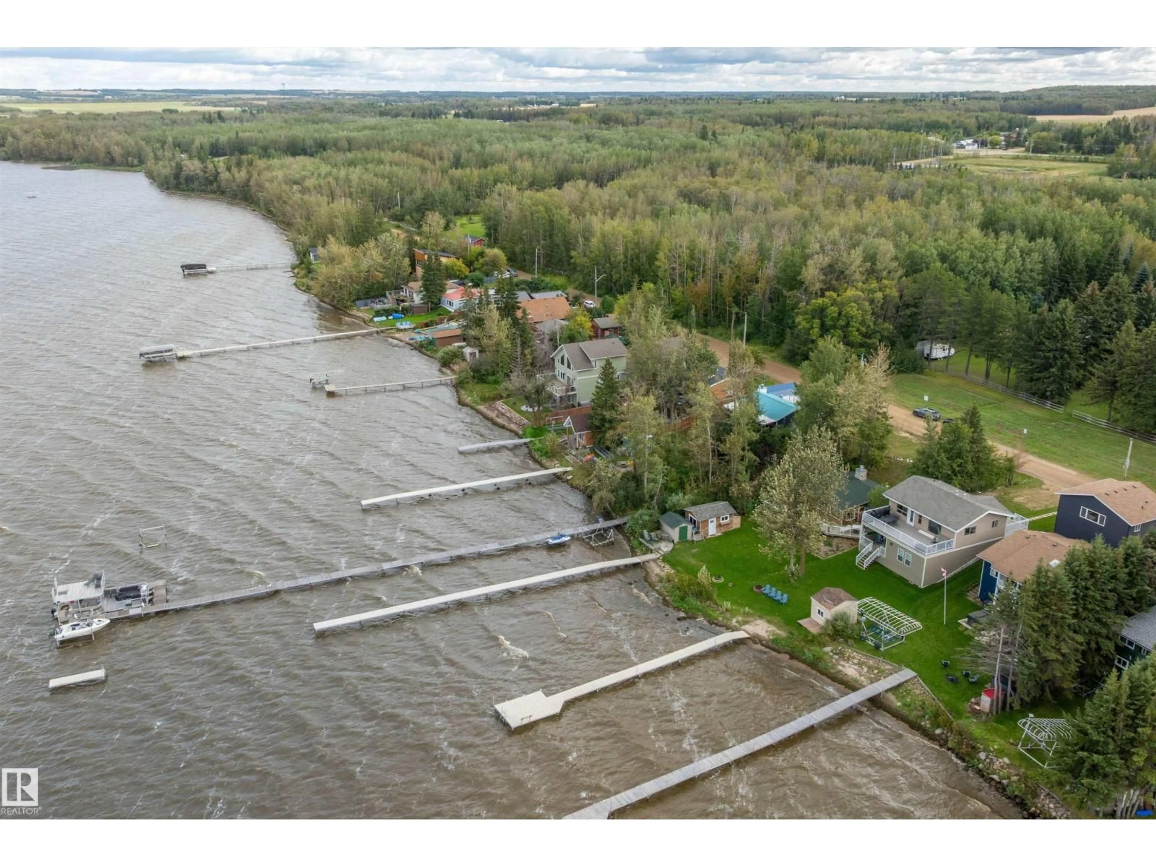 A pic from outside/outdoor area/front of a property/back of a property/a pic from drone, water/lake/river/ocean view for 10 - 50 RGE ROAD, Rural Wetaskiwin County Alberta T0C2V0
