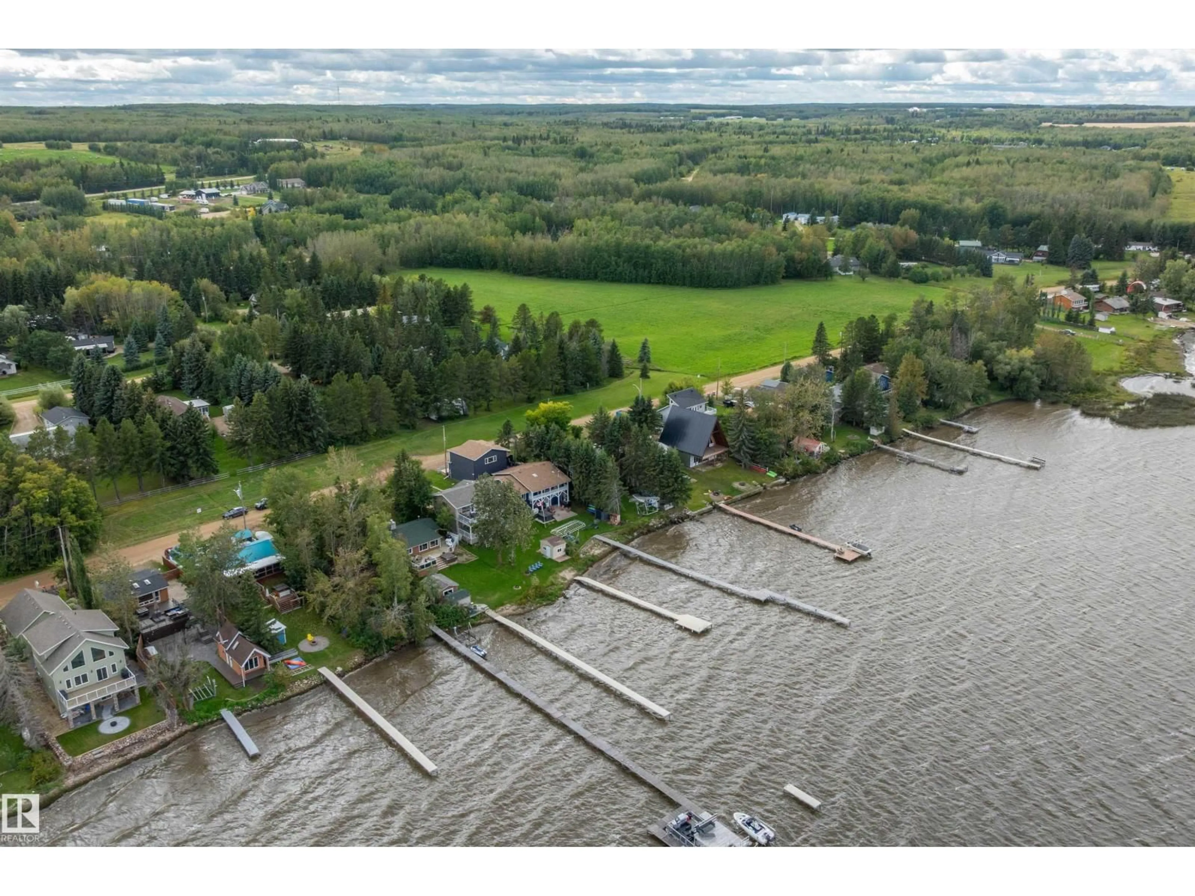 A pic from outside/outdoor area/front of a property/back of a property/a pic from drone, water/lake/river/ocean view for 10 - 50 RGE ROAD, Rural Wetaskiwin County Alberta T0C2V0