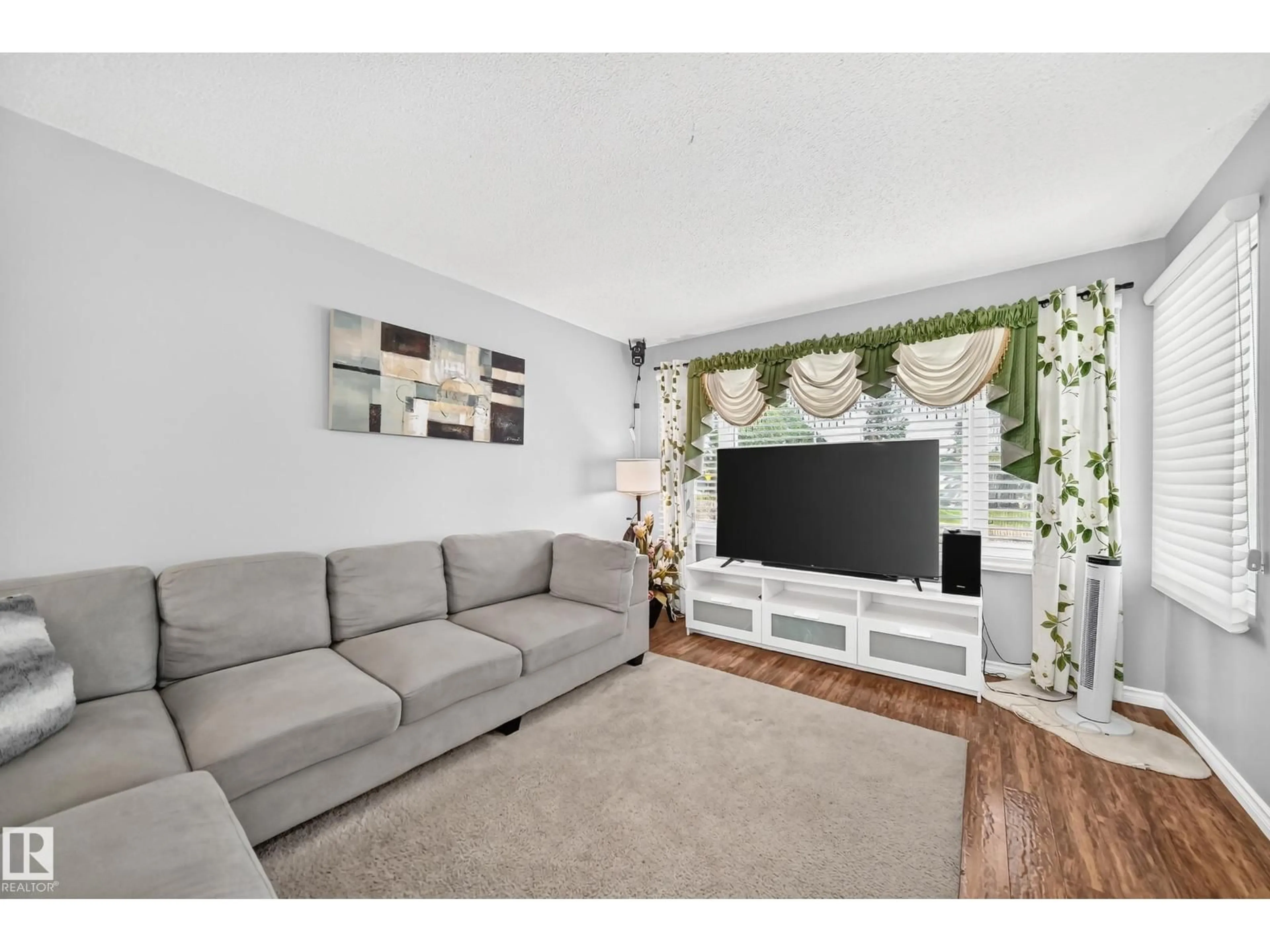 Living room with furniture, unknown for NW - 12209 134B AV, Edmonton Alberta T5L3W9