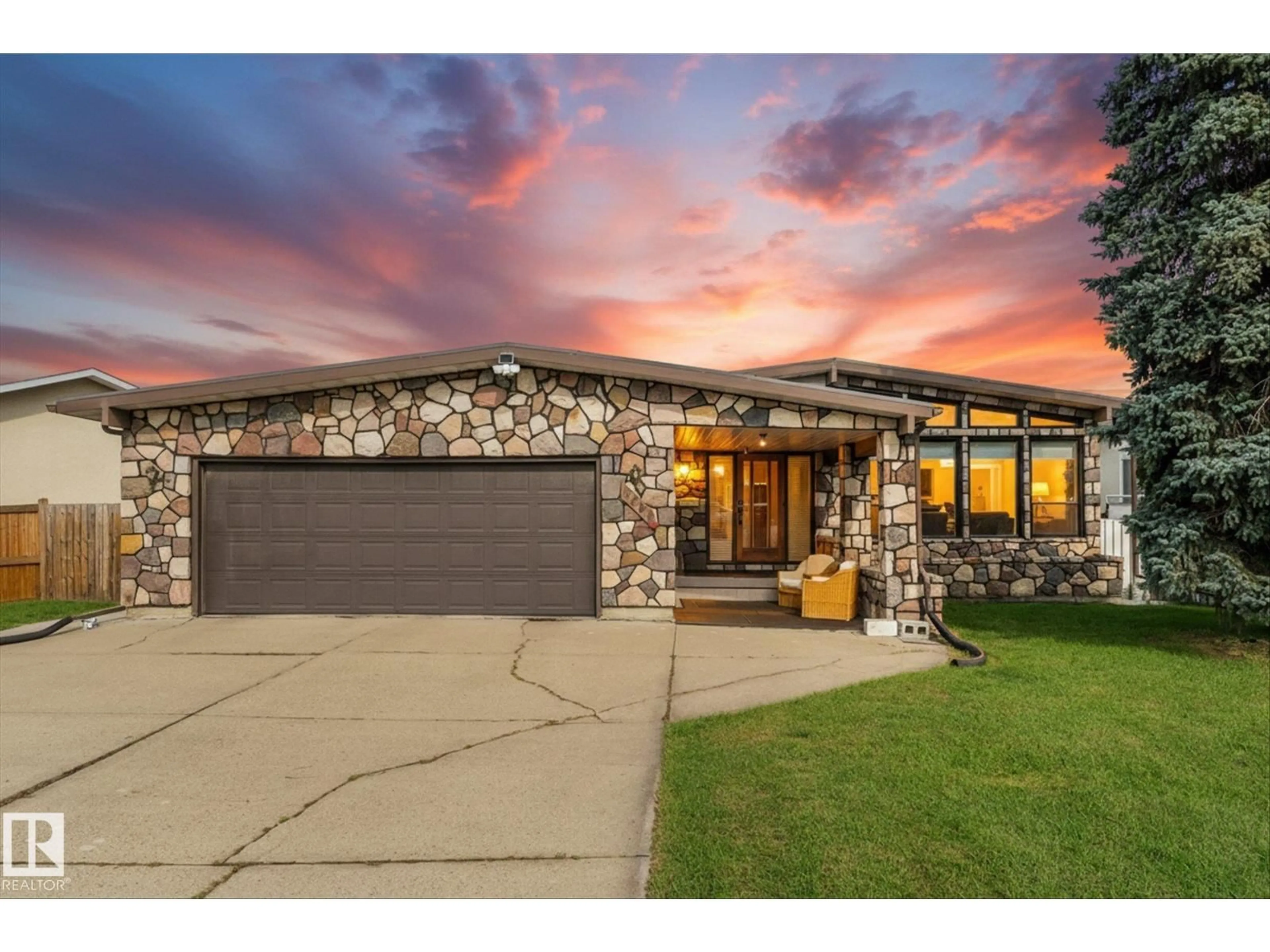 Home with brick exterior material, street for 9504 139 AV, Edmonton Alberta T5E5Z8