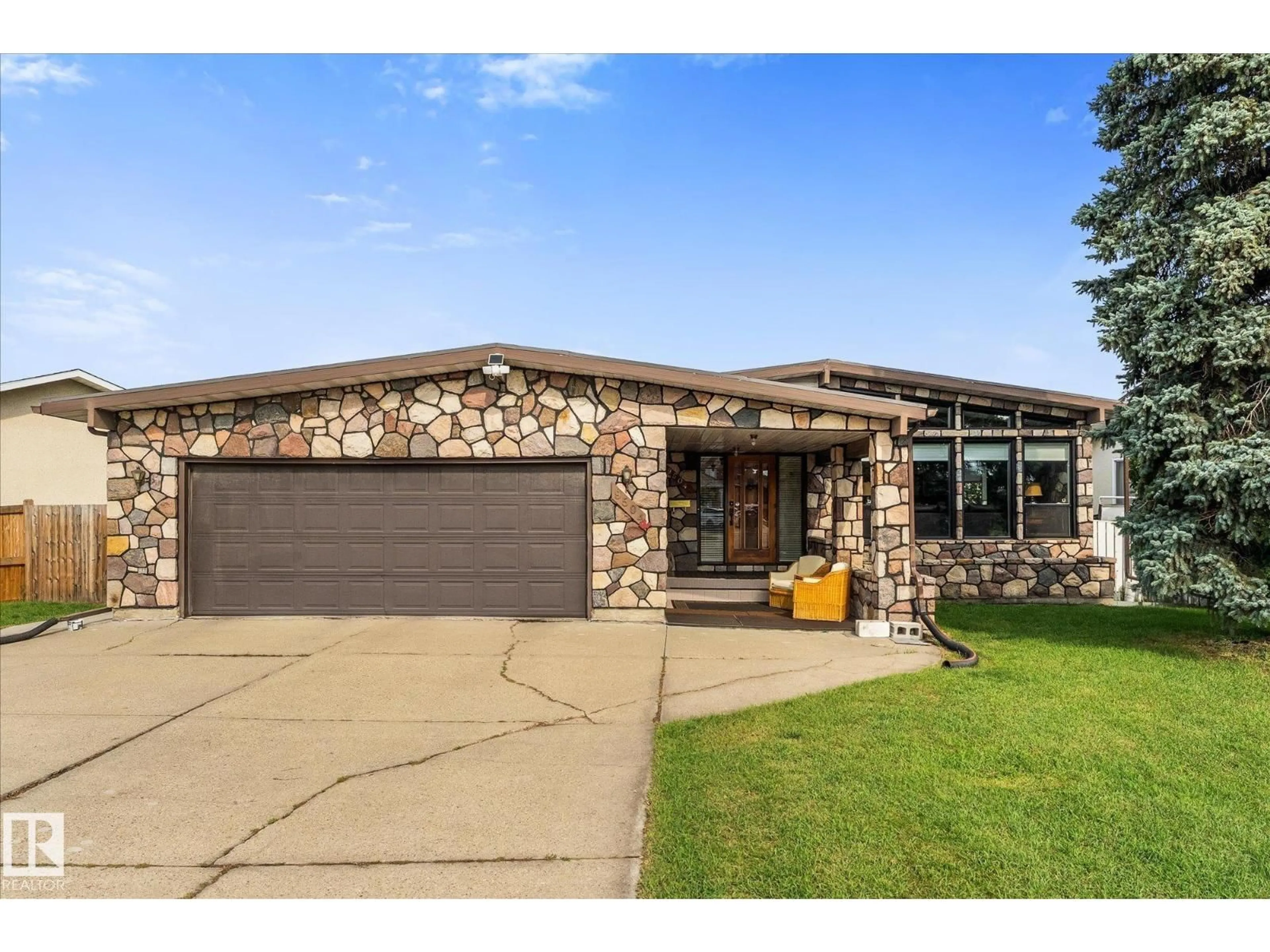Home with brick exterior material, street for 9504 139 AV, Edmonton Alberta T5E5Z8