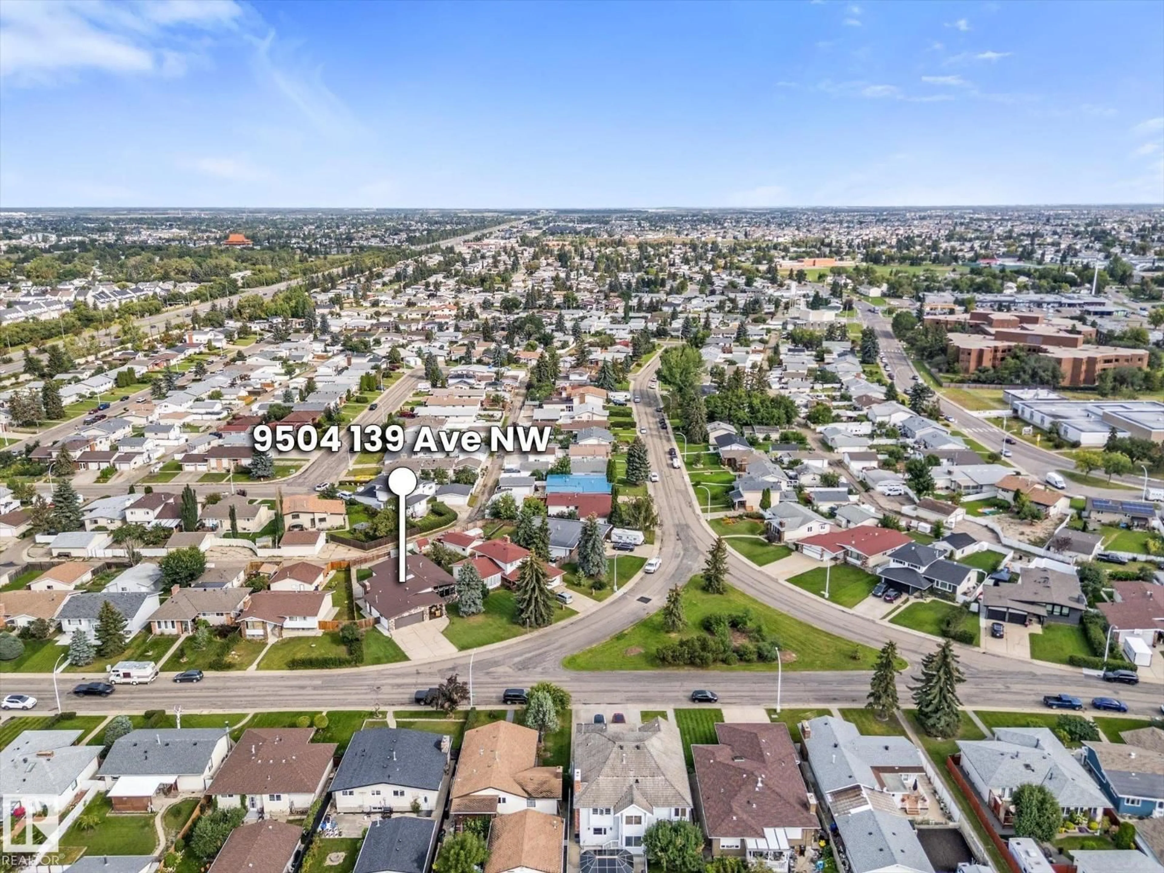 A pic from outside/outdoor area/front of a property/back of a property/a pic from drone, unknown for 9504 139 AV, Edmonton Alberta T5E5Z8