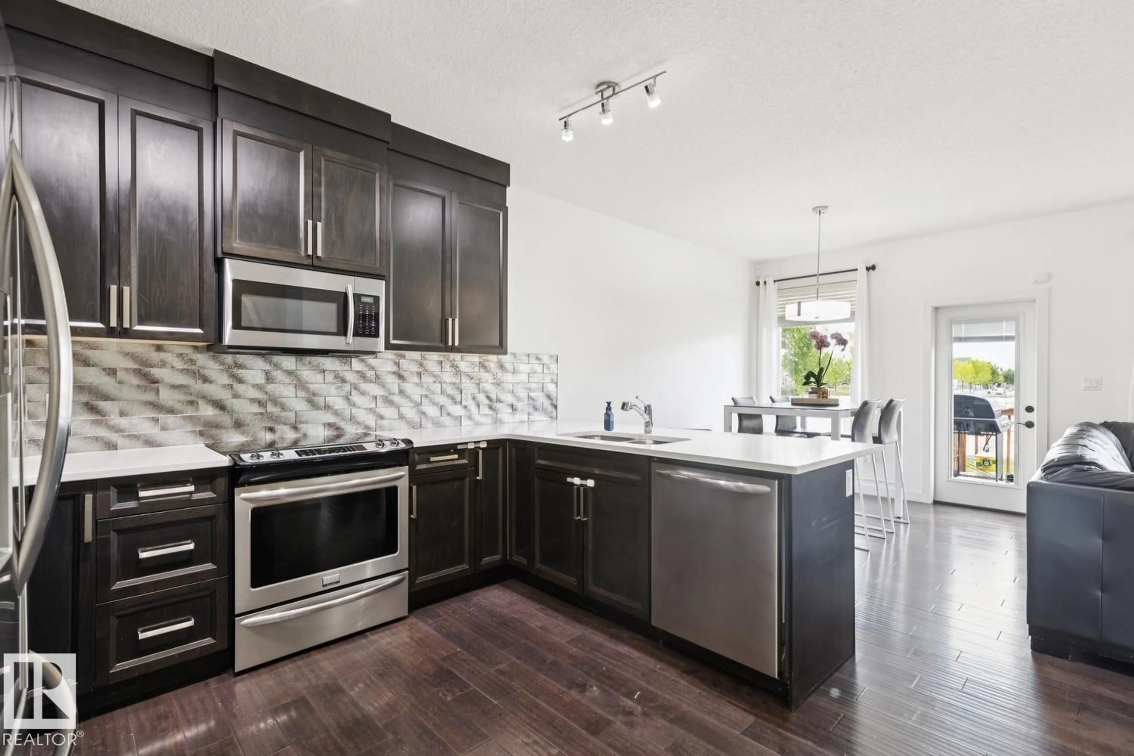 Open concept kitchen, unknown for SW - 1320 162 ST, Edmonton Alberta T6W2L1