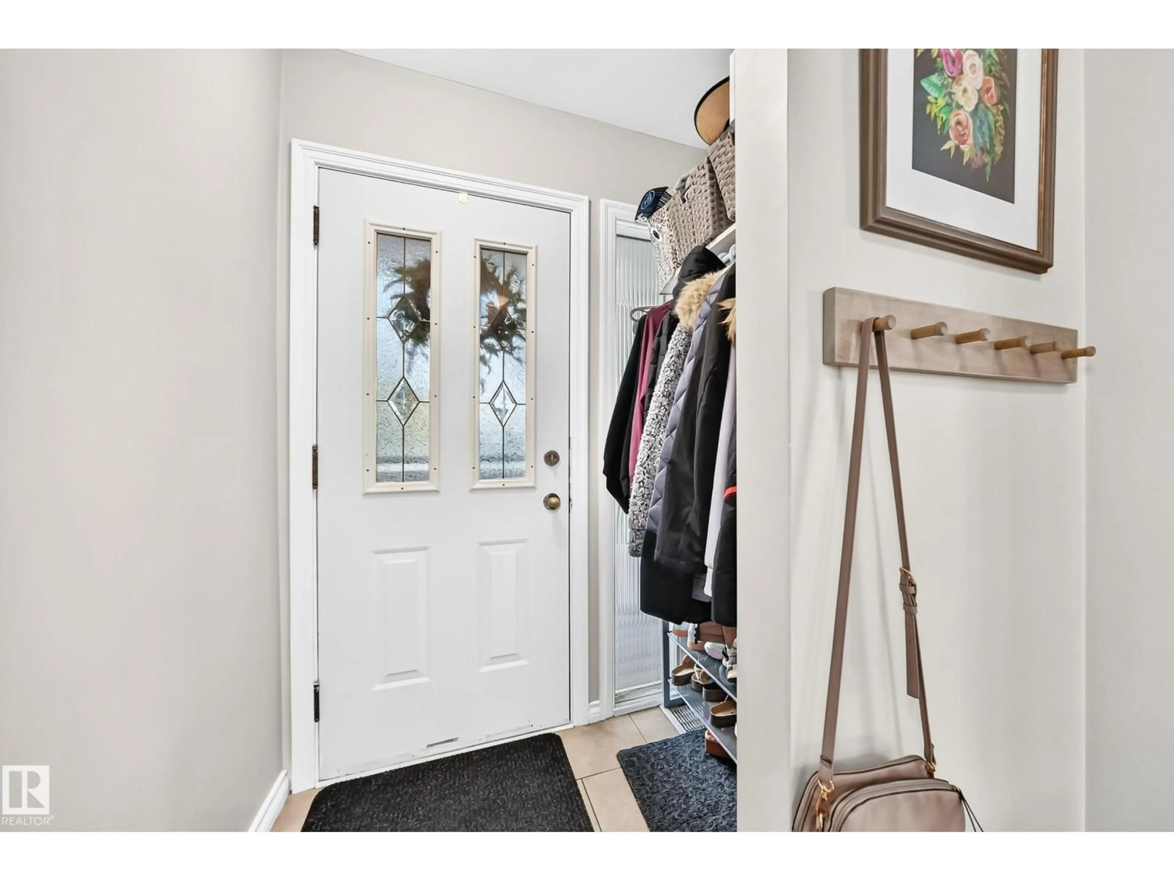 Indoor entryway for 11524 133 ST, Edmonton Alberta T5M1H4