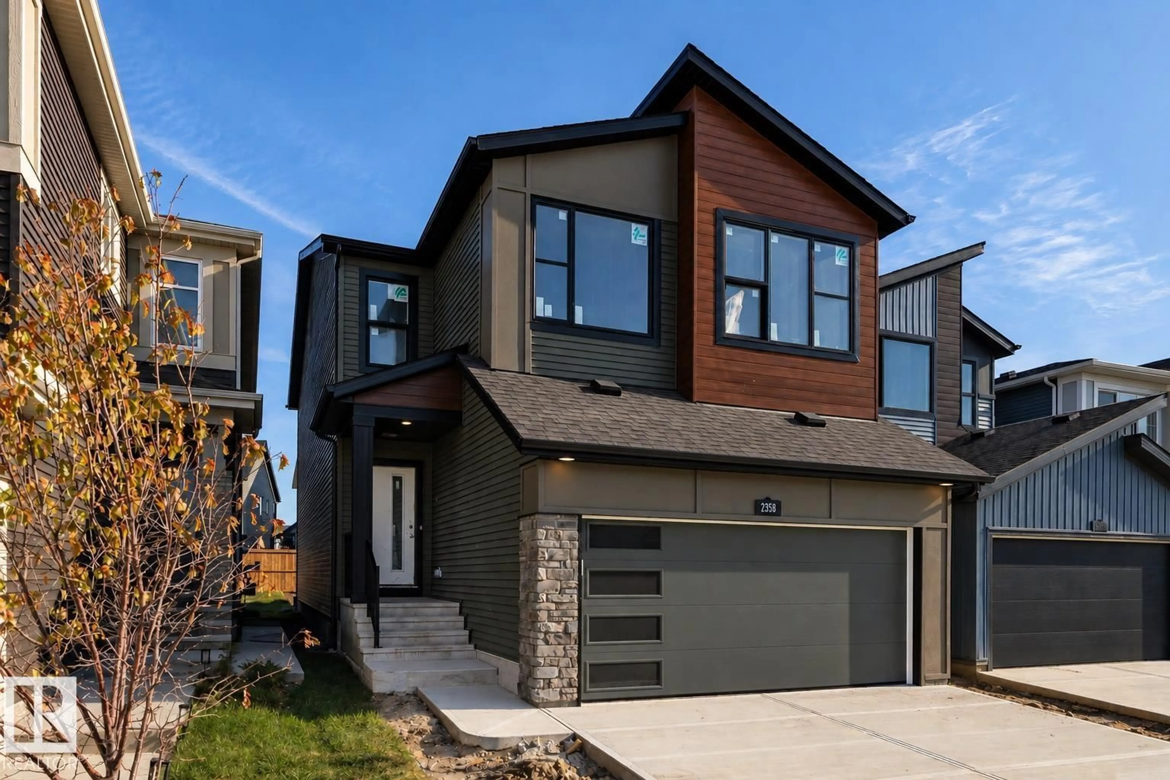 Home with brick exterior material, street for 2358 MUCKLEPLUM WY, Edmonton Alberta T6X3J9