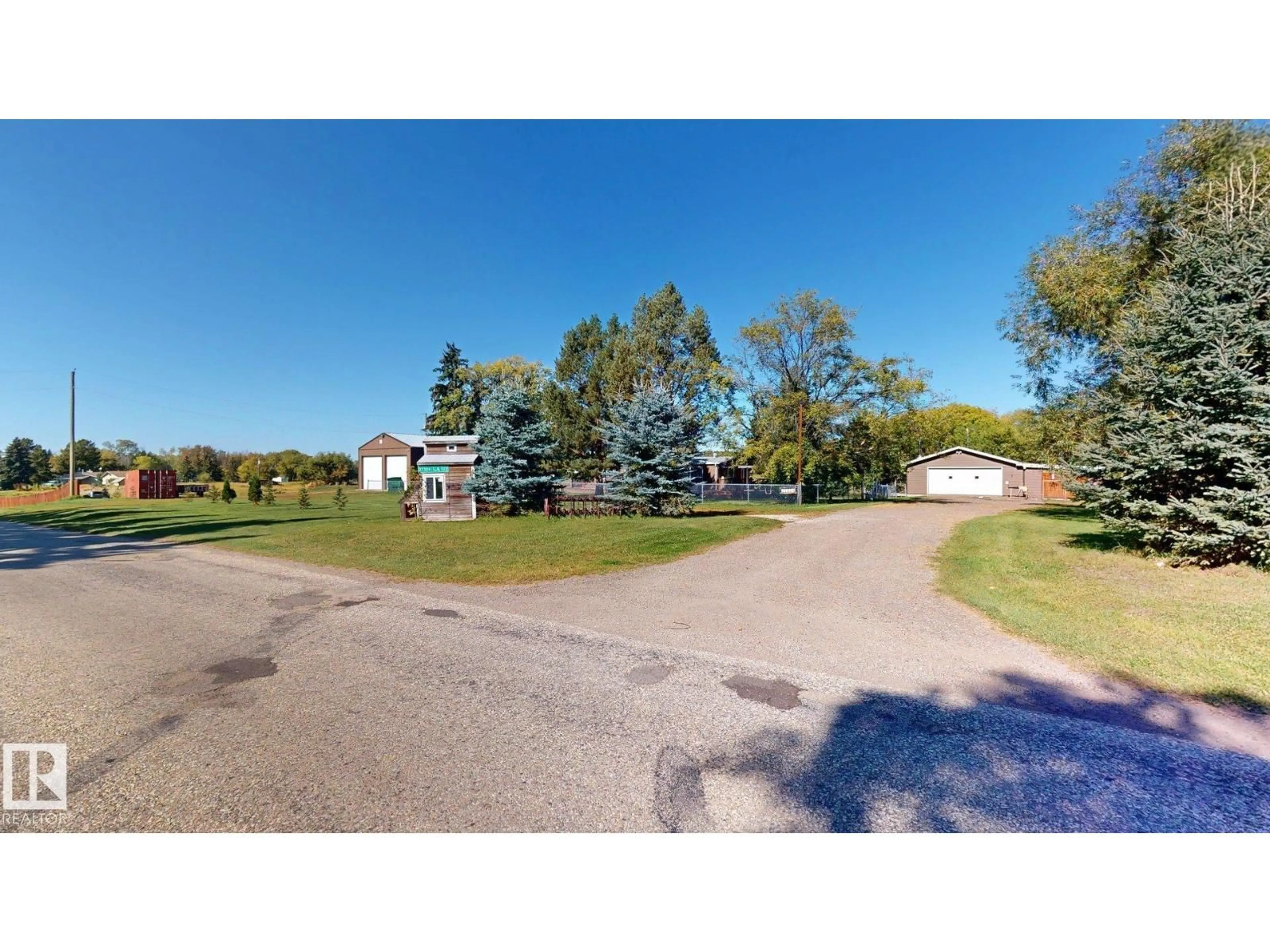 A pic from outside/outdoor area/front of a property/back of a property/a pic from drone, unknown for 27324 TOWNSHIP RD, Rural Parkland County Alberta T7X3S2